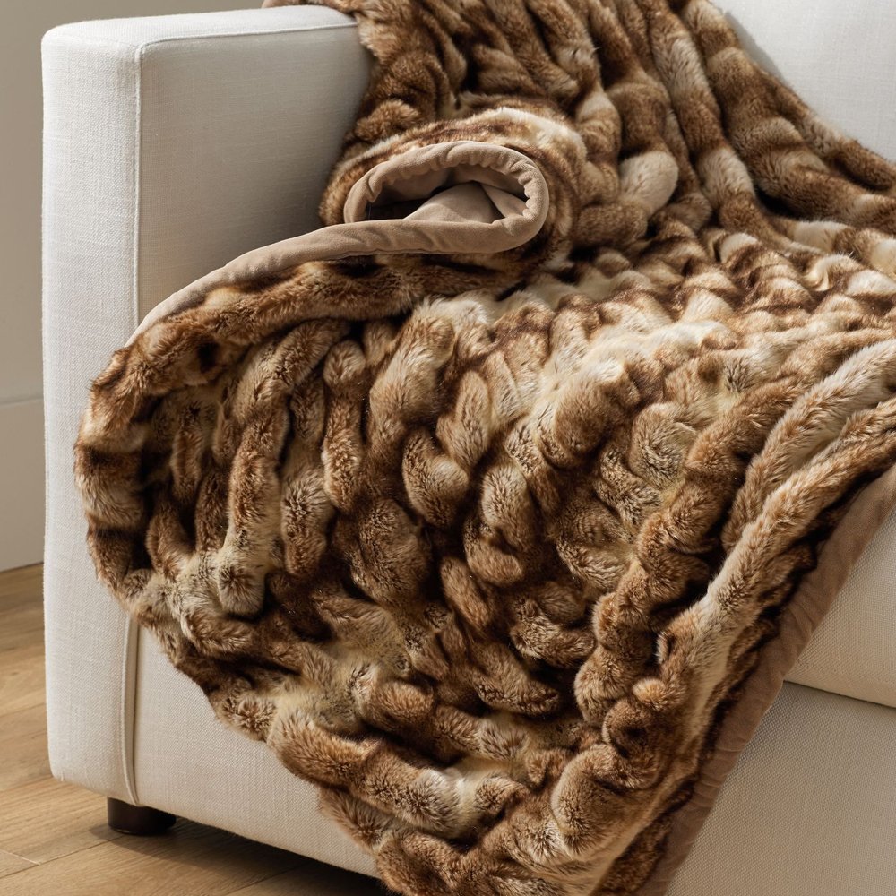 Faux Fur Ruched Throw, $179, Pottery Barn