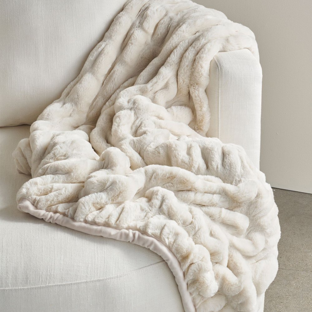 Faux Fur Ruched Throw, from $179, Pottery Barn