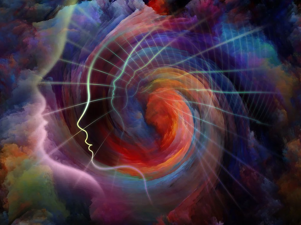 silhouette of a person with colorful swirls