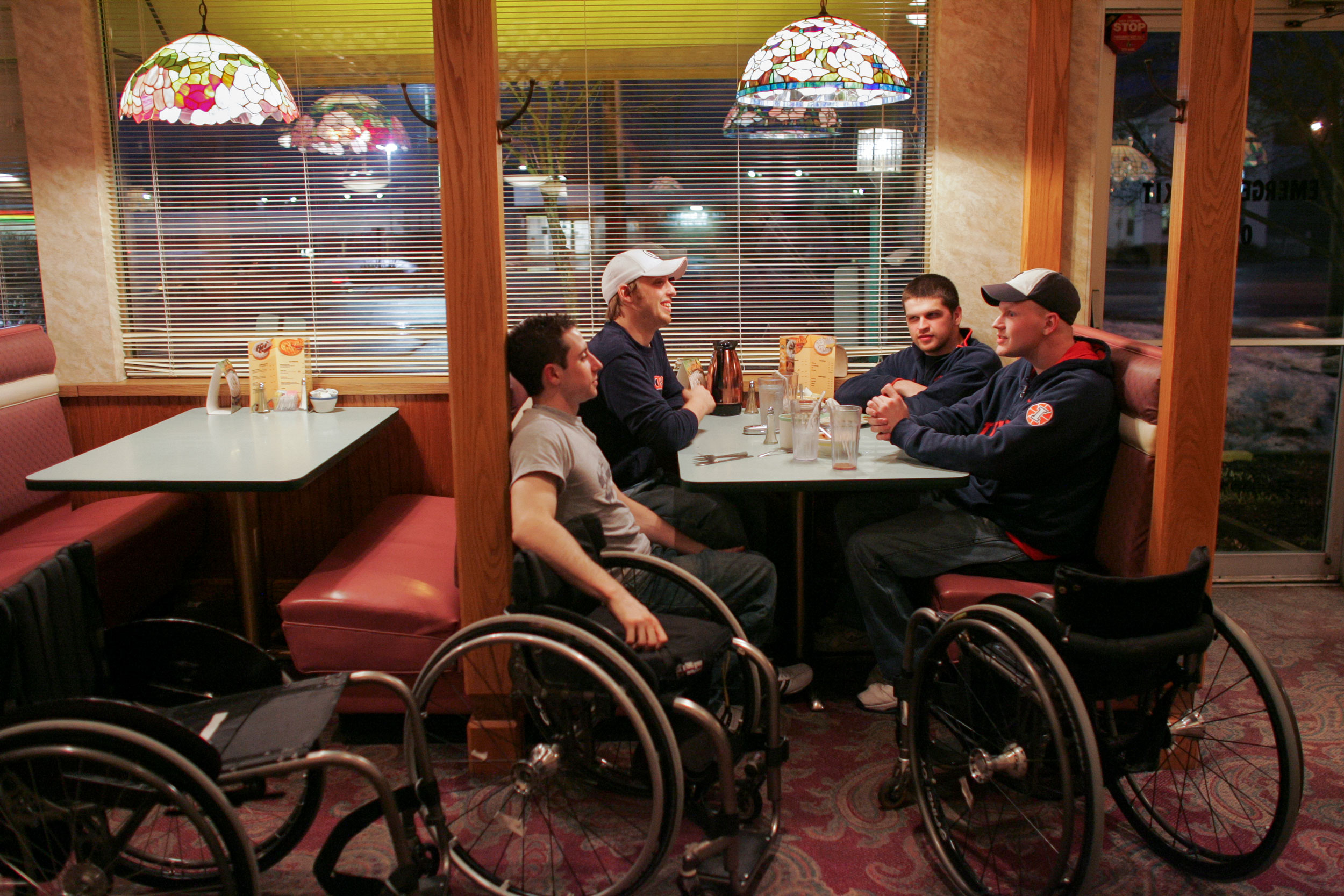 From left, Steve Serio, Brandon Wagner, Brian Sheehan, and Matt Buchi eat dinner together at Perkins Family Restaurant after an Edinboro University tournament.