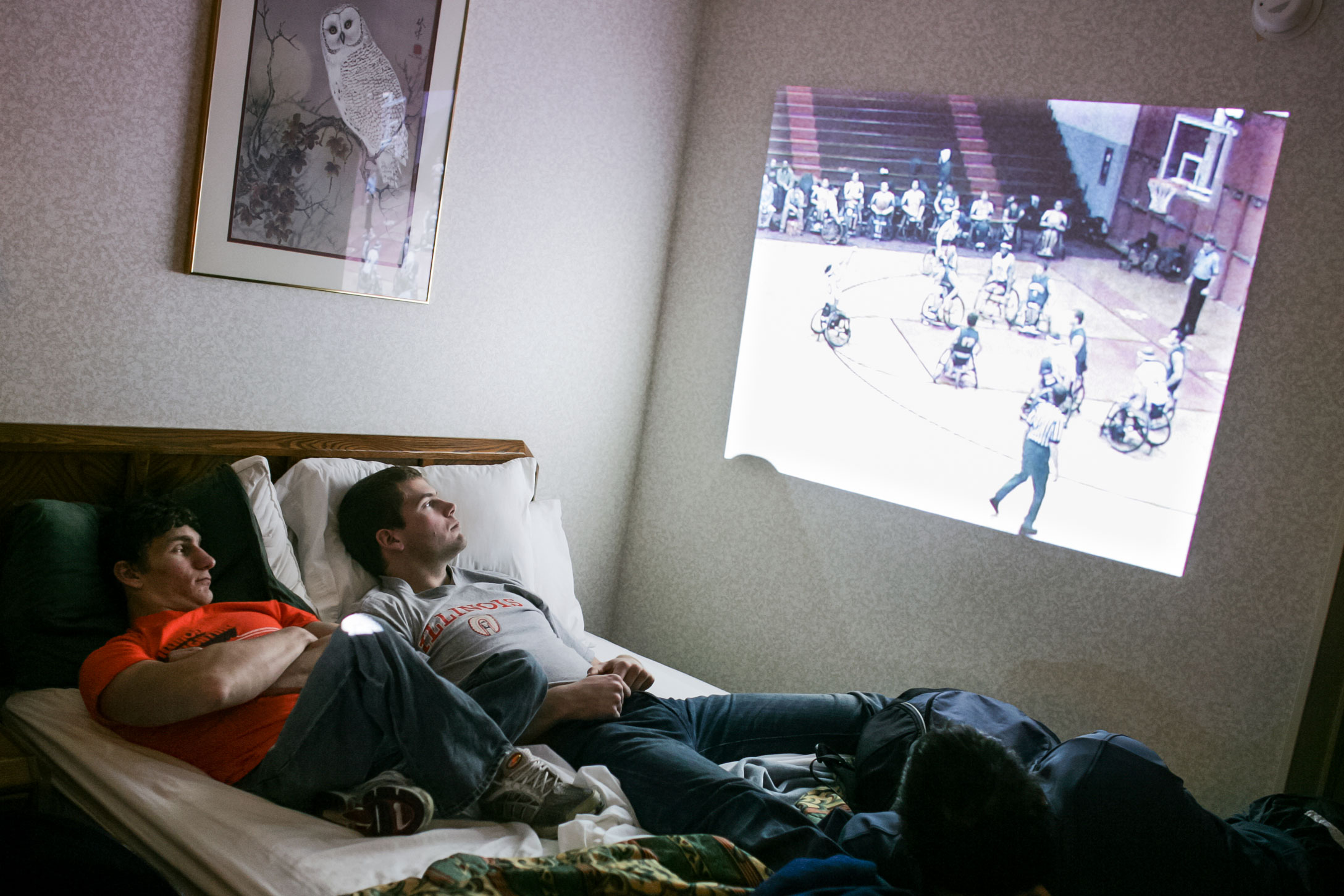 Josh George, left, and Lars Spenger watch video of a previous game against Edinboro University in head coach Mike Frogley's hotel room. They regularly study past games to learn from mistakes and improve.