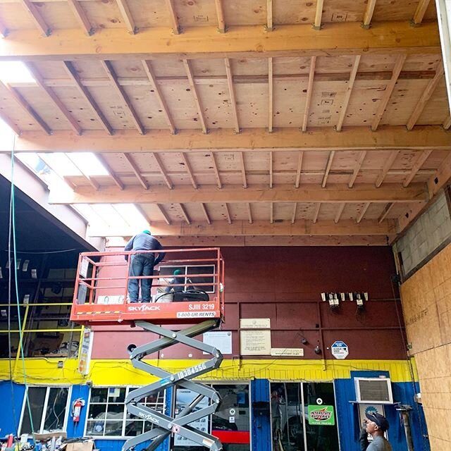 Rebuilding a commercial roof that collapsed from water build up (rain) at an auto shop in Highland Park, CA.