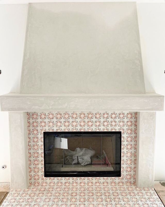 Tile + plaster on living room fireplace is complete (still needs to be painted)