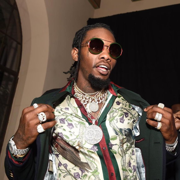 Hip-hop artist Offset, member of trio Migos, rocking an intricate Gucci button down shirt and jacket.