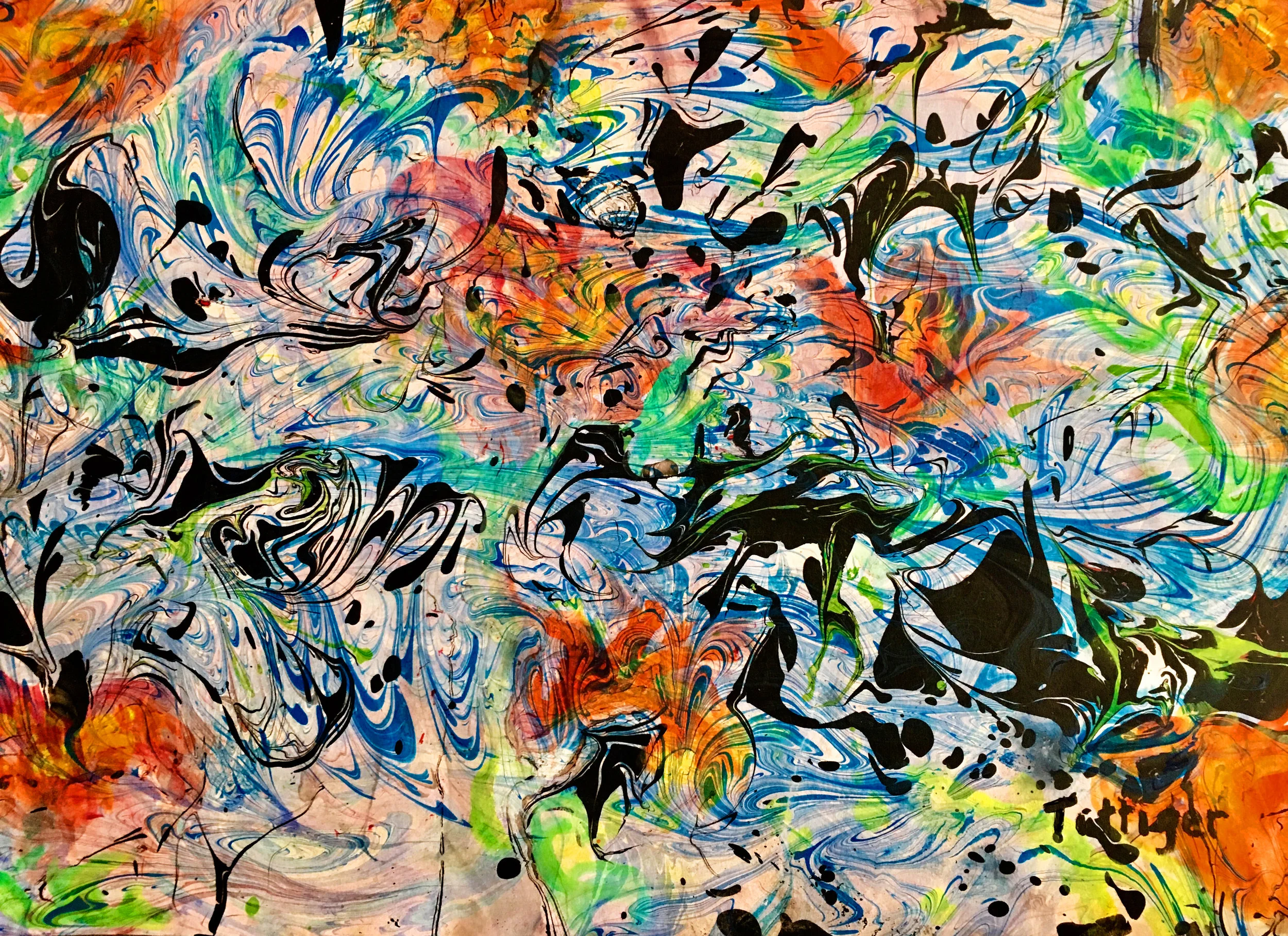 PETALS IN THE WATER This is an 18 x 24 acrylic marbling. I initially marbled the orange flowers on this painting. I then marbled this two more times to tone down the orange. I like the effect of this. It reminds me of petals floating in the water hence the name.