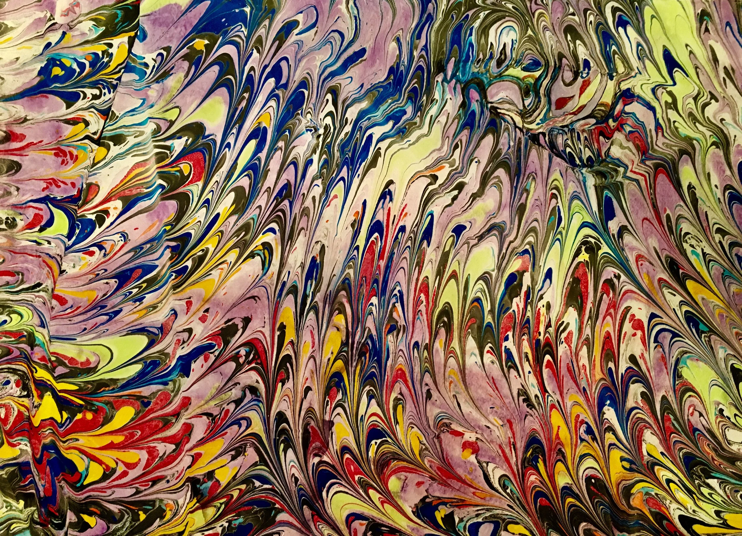 DOWNWARD COLOR This is an 18 x 24 acrylic marbling that a comb was used to create this design.
