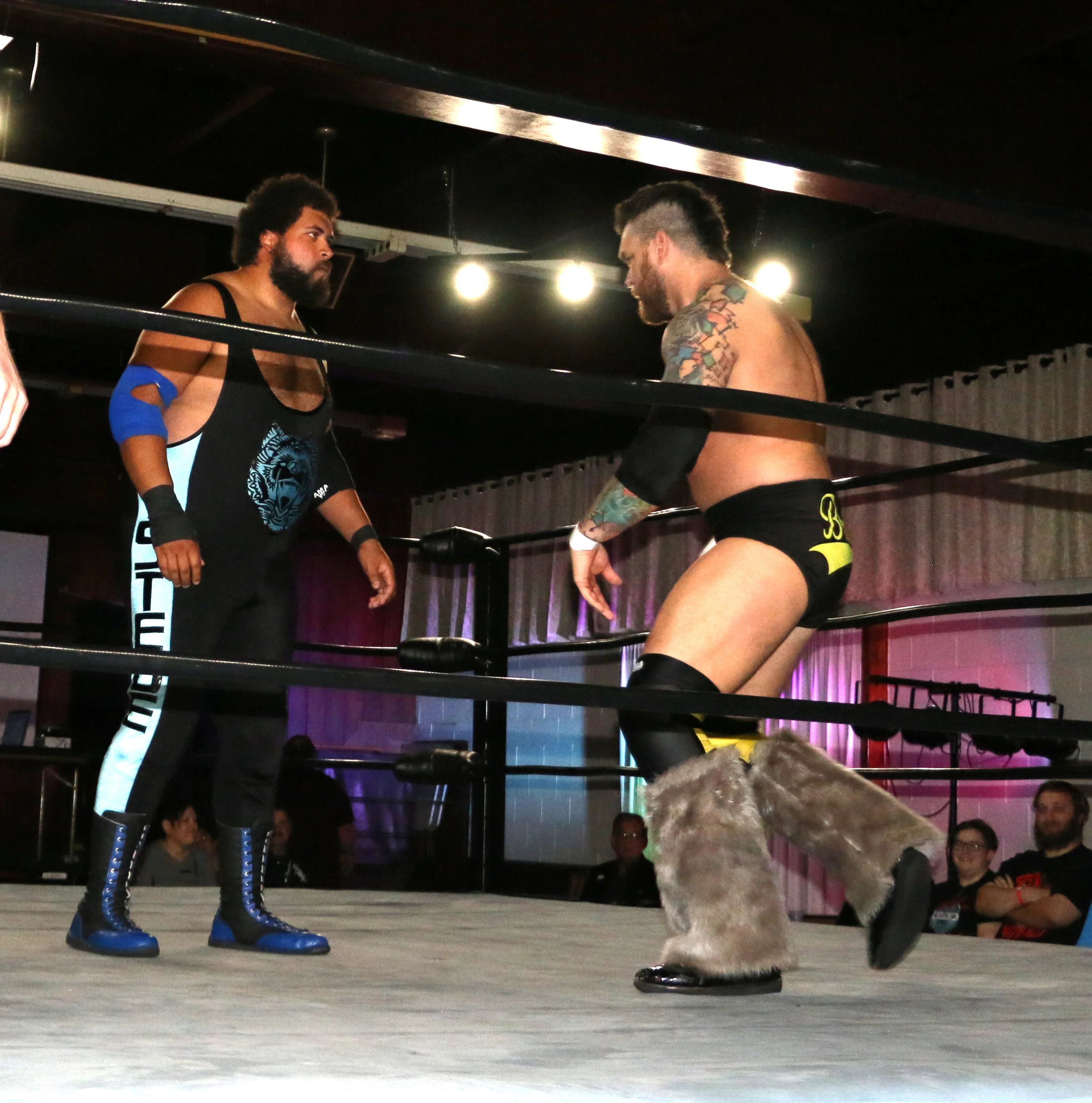 Steve Michaels, left, sizes up veteran Jay Bradley in their semi-main event match of Berwyn Championship Wrestling’s show at the Berwyn Eagles Club on Saturday, Sept. 22, 2018. (Photo by Mike Pankow)