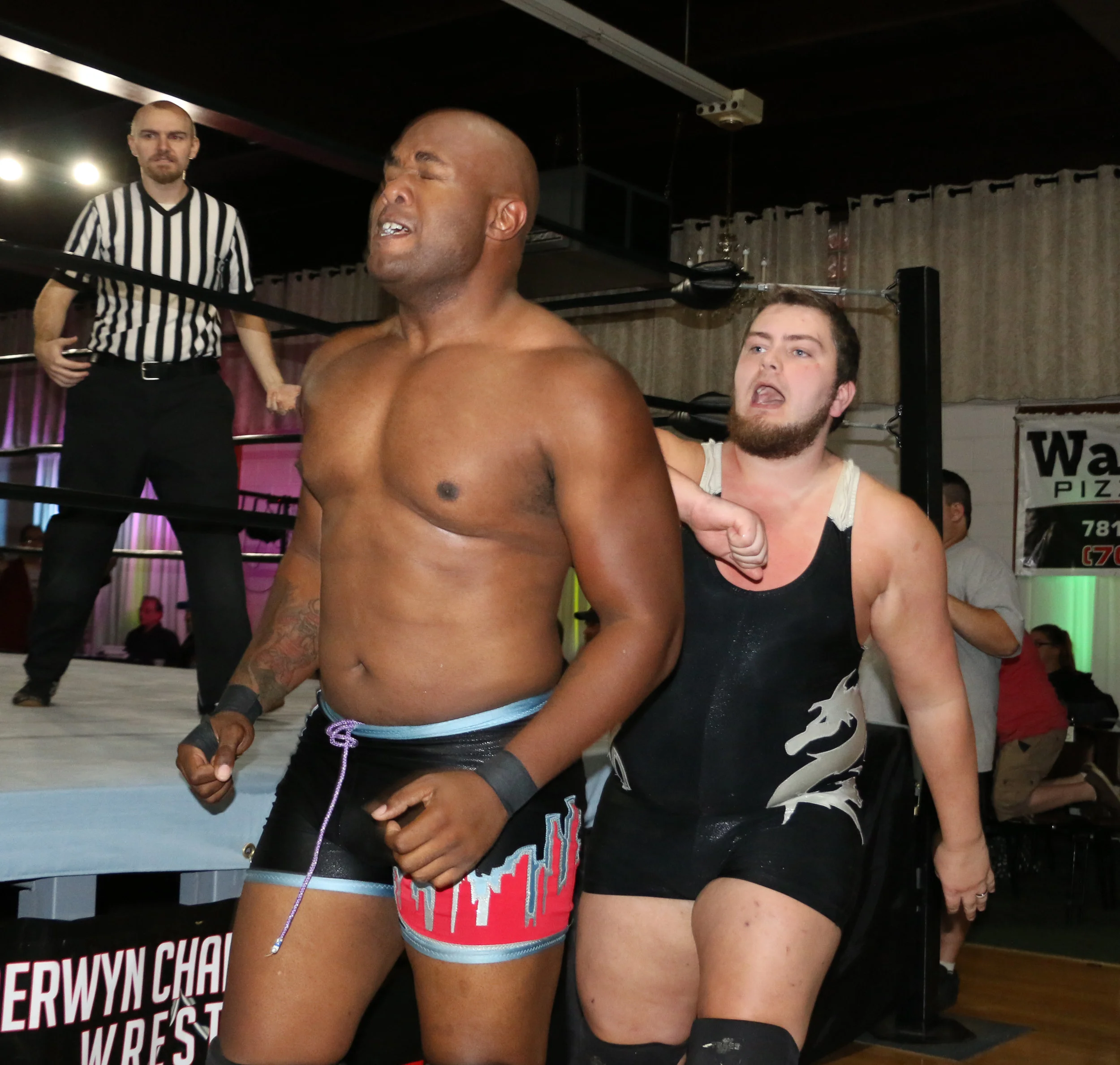 “Shogun” Chris Logan, taking a shot from Josh Crane at a Berwyn Championship Wrestling show in September 2018, will defend the BCW Championship on March 16. (Photo by Mike Pankow)