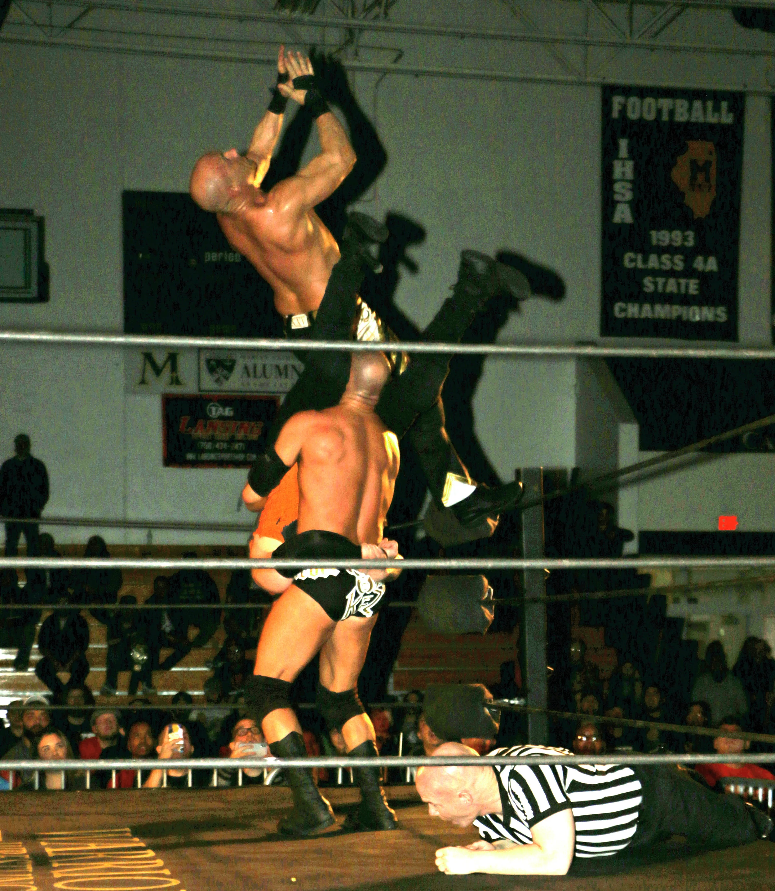 SCU’s Christopher Daniels, top, and Frankie Kazarian perform the “Best Meltzer Ever” to oVe’s Jake Crist to win the main event six-man tag team match at Warrior Wrestling 4 on Friday, March 15. (Photo by Mike Pankow)