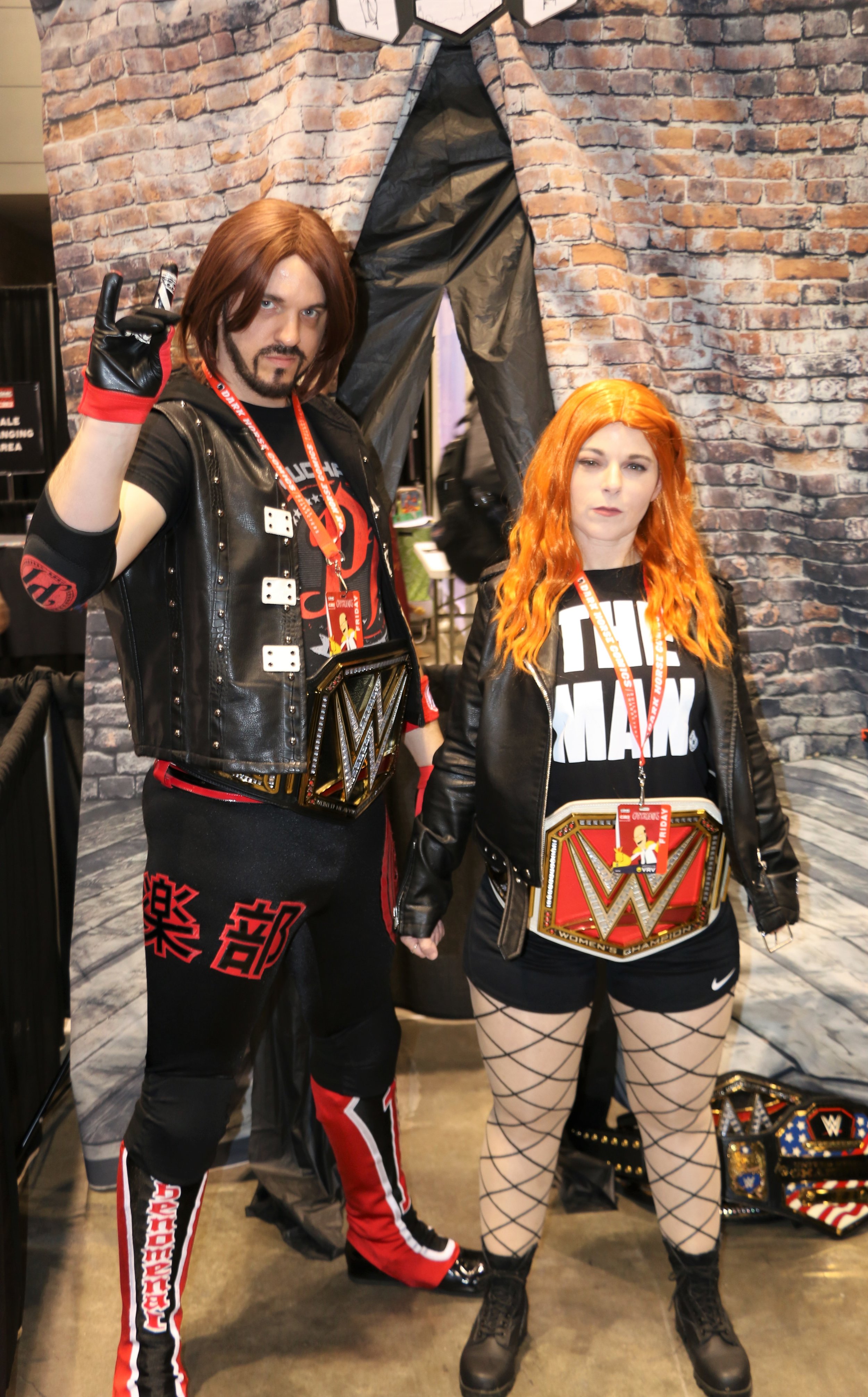  AJ Styles and Becky Lynch cosplayers at the Two Sweet Cosplay booth. 