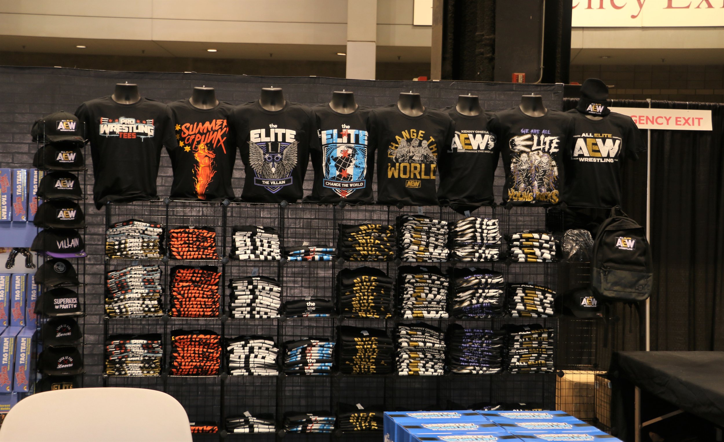  Pro Wrestling Tees booth stocked with T-shirts. 