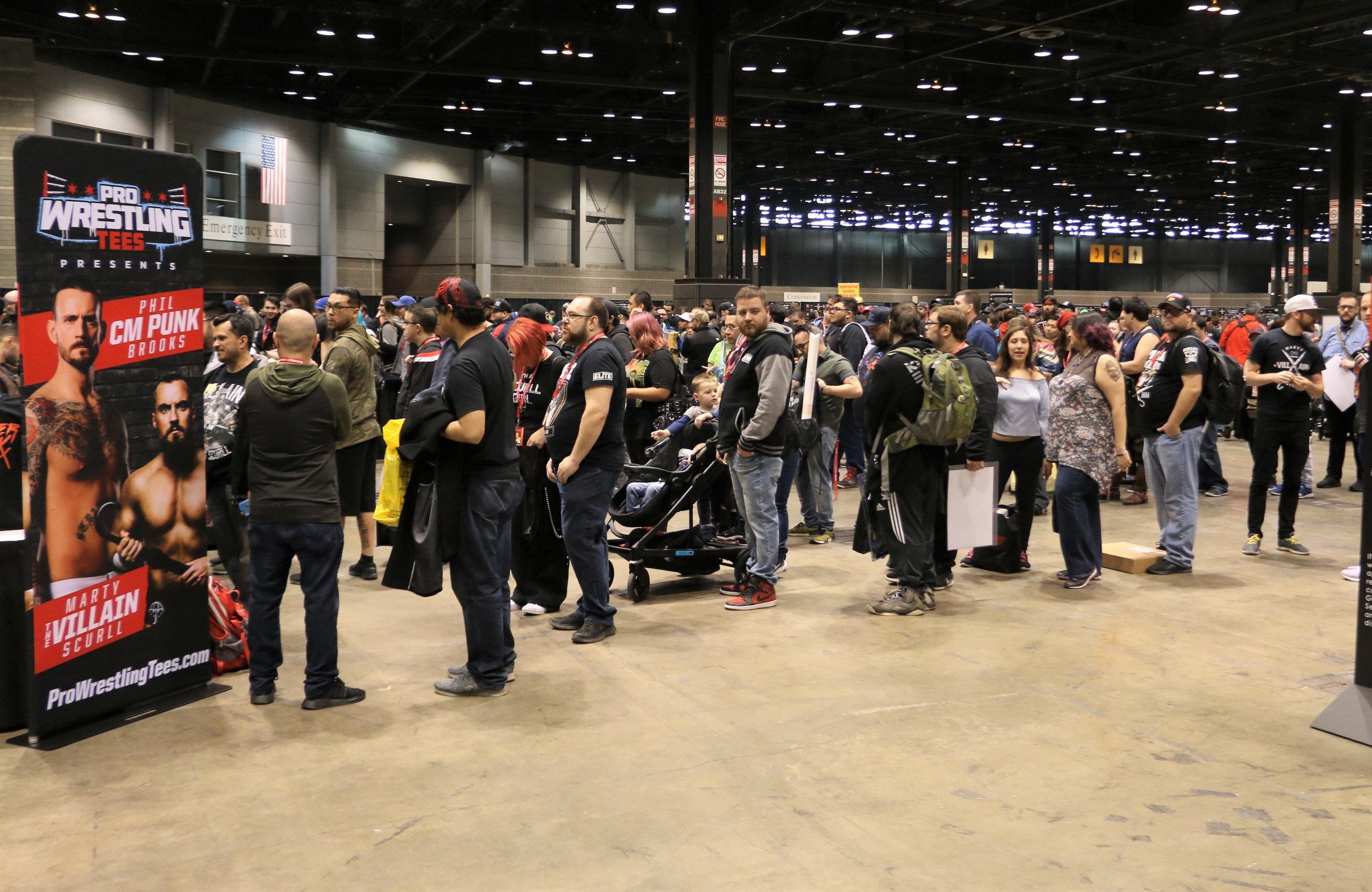  Long lines for Marty Scurll and CM Punk at the Pro Wrestling Tees booth. 