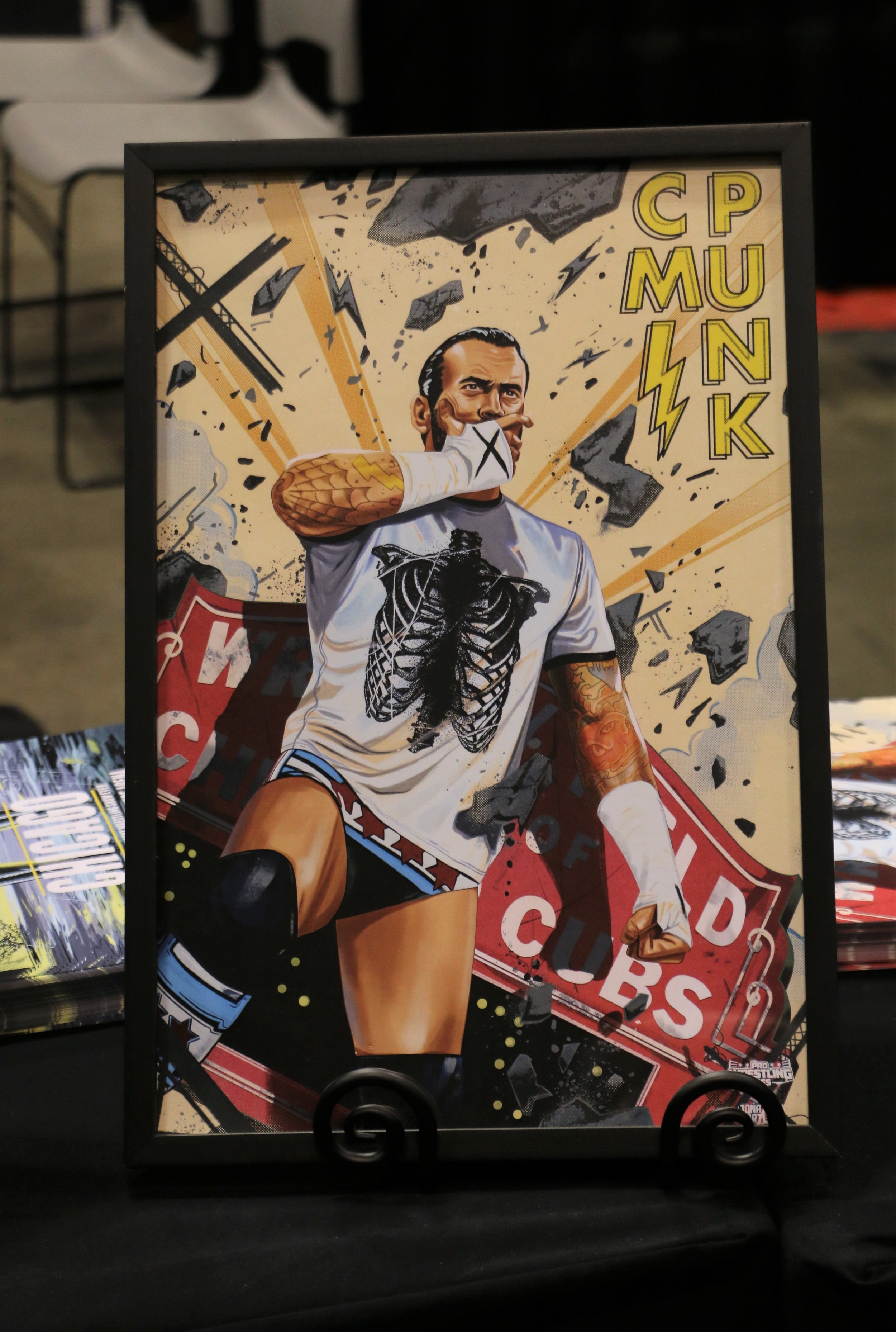  CM Punk portrait at the Pro Wrestling Tees booth. 