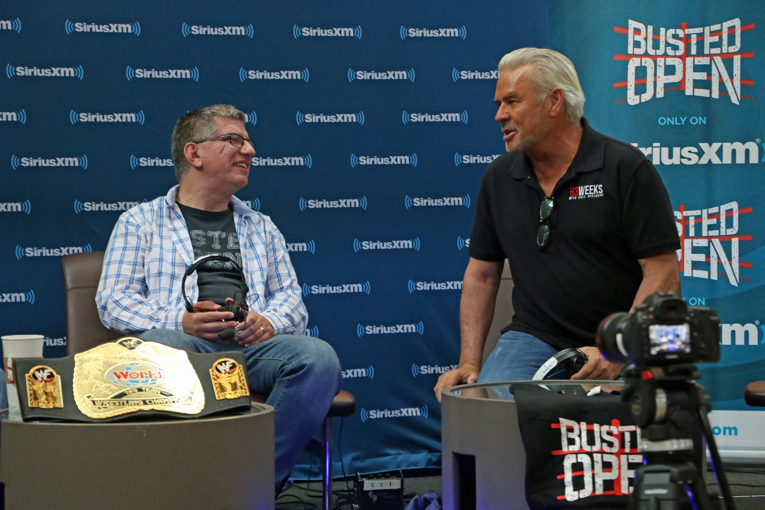 Busted Open host Dave LaGreca, left, talks with former WCW President Eric Bischoff during STARRCAST last summer in suburban Chicago. (Photo by Mike Pankow)
