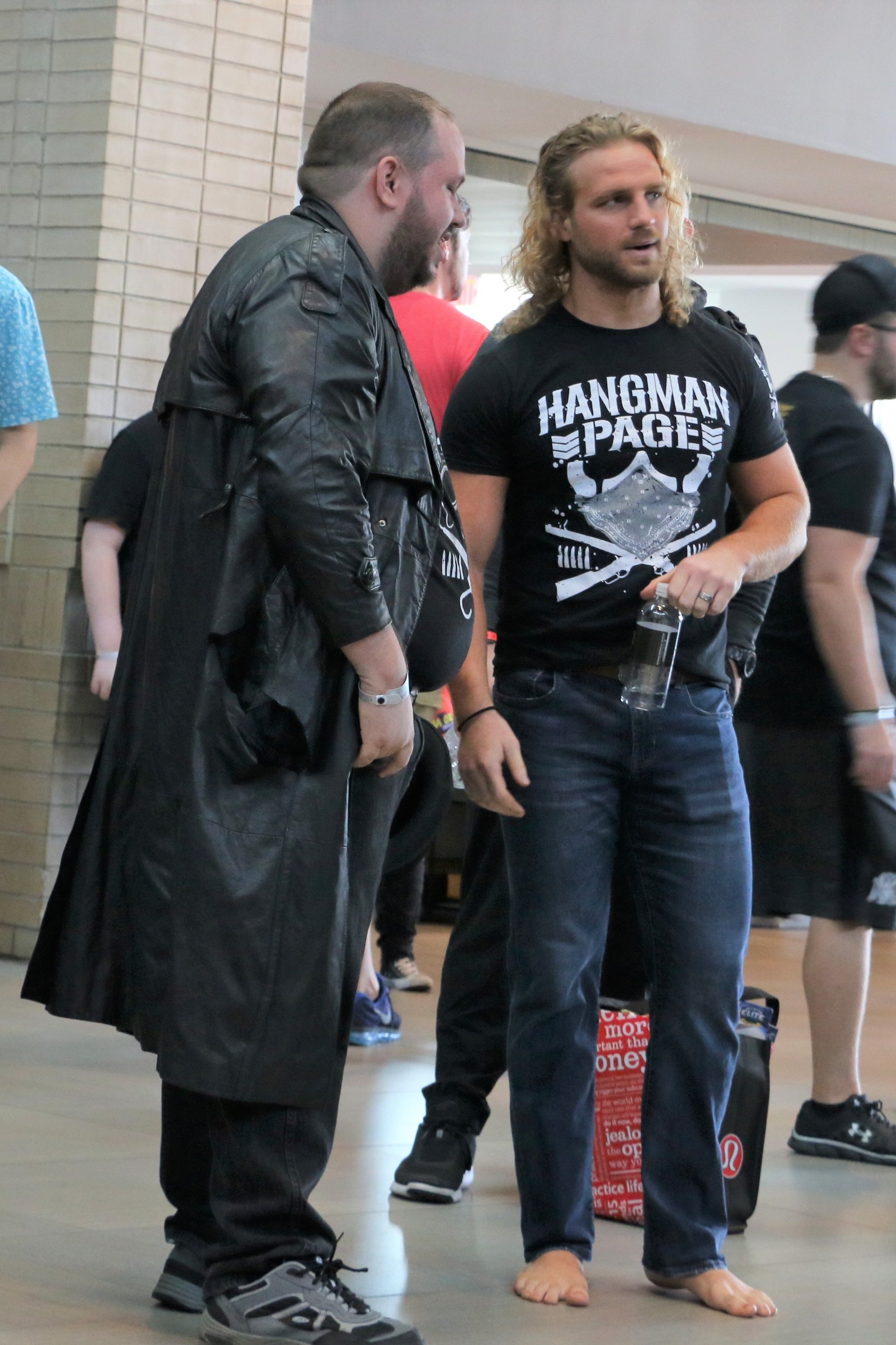 AEW’s Hangman Page, right, speaks with wrestling fan Ezra Vickrey during last year’s Starrcast event. (Photo by Mike Pankow)