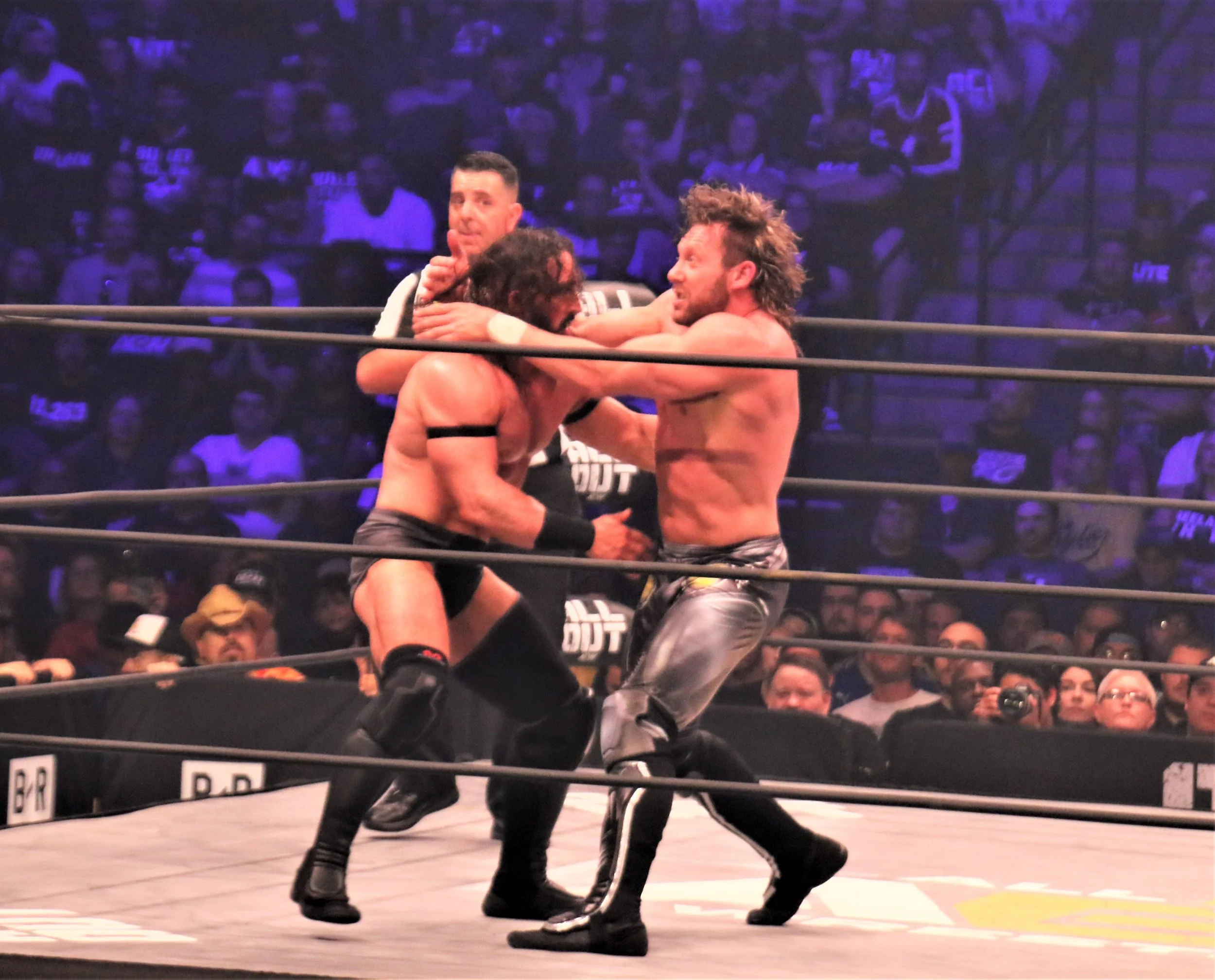 PAC, left, and Kenny Omega slug it out in what arguably was the best match of the night, in which PAC pulled off the upset. (Photo by Mike Pankow)