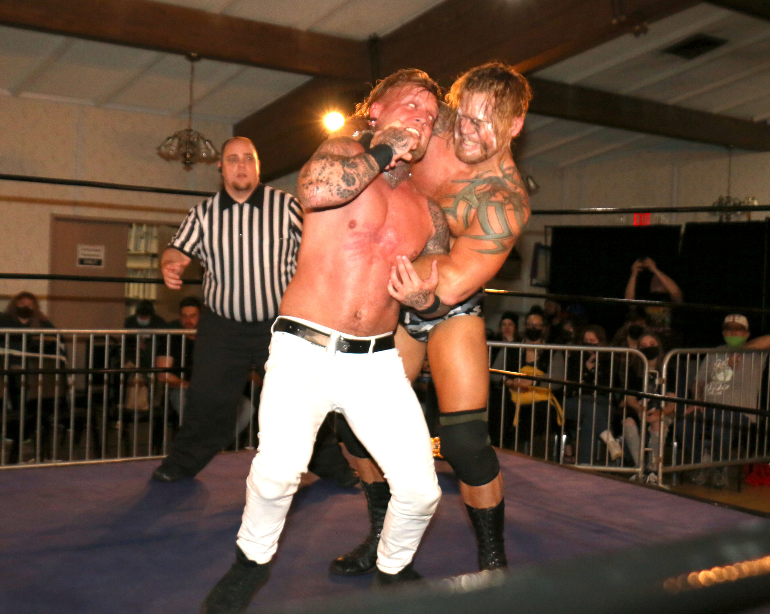 Garrisaon Creed, right, tries to maintain control of “Filth King” Nick Brubaker during the main event of Chicago Style Wrestling’s “Inglorious Basterds” on Friday, April 16, 2021 in Franklin Park. Brubaker retained the CSW Championship. (Photo by Mi…