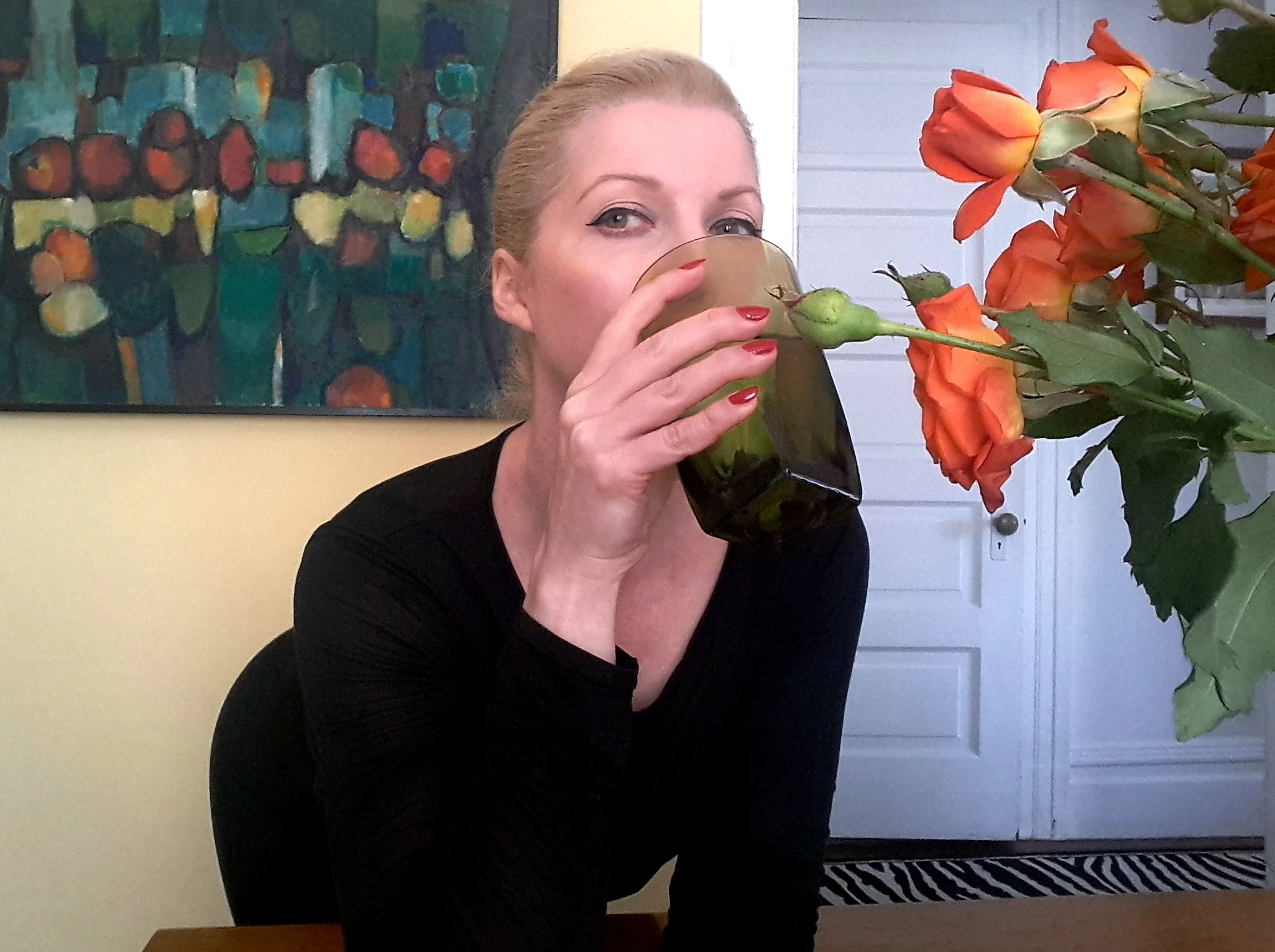 Marci+Bowman-drinking-water-orange-roses.jpg