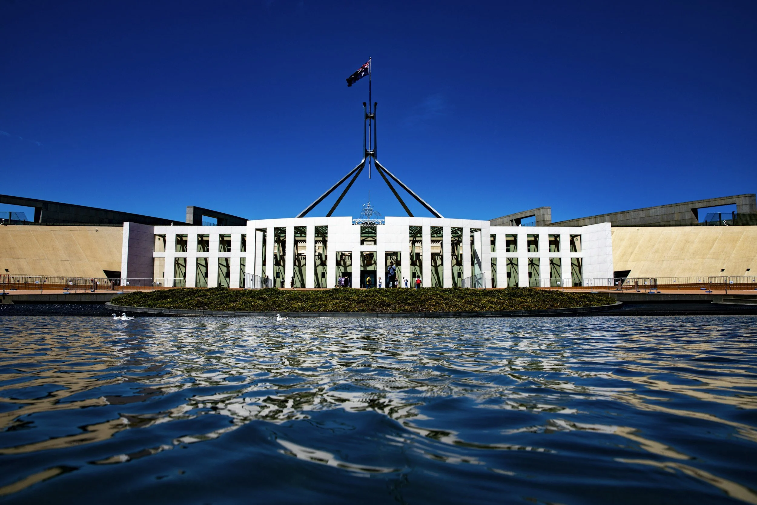 GOVT. SPENDING OUTPACES TAX; PENSIONS TIP