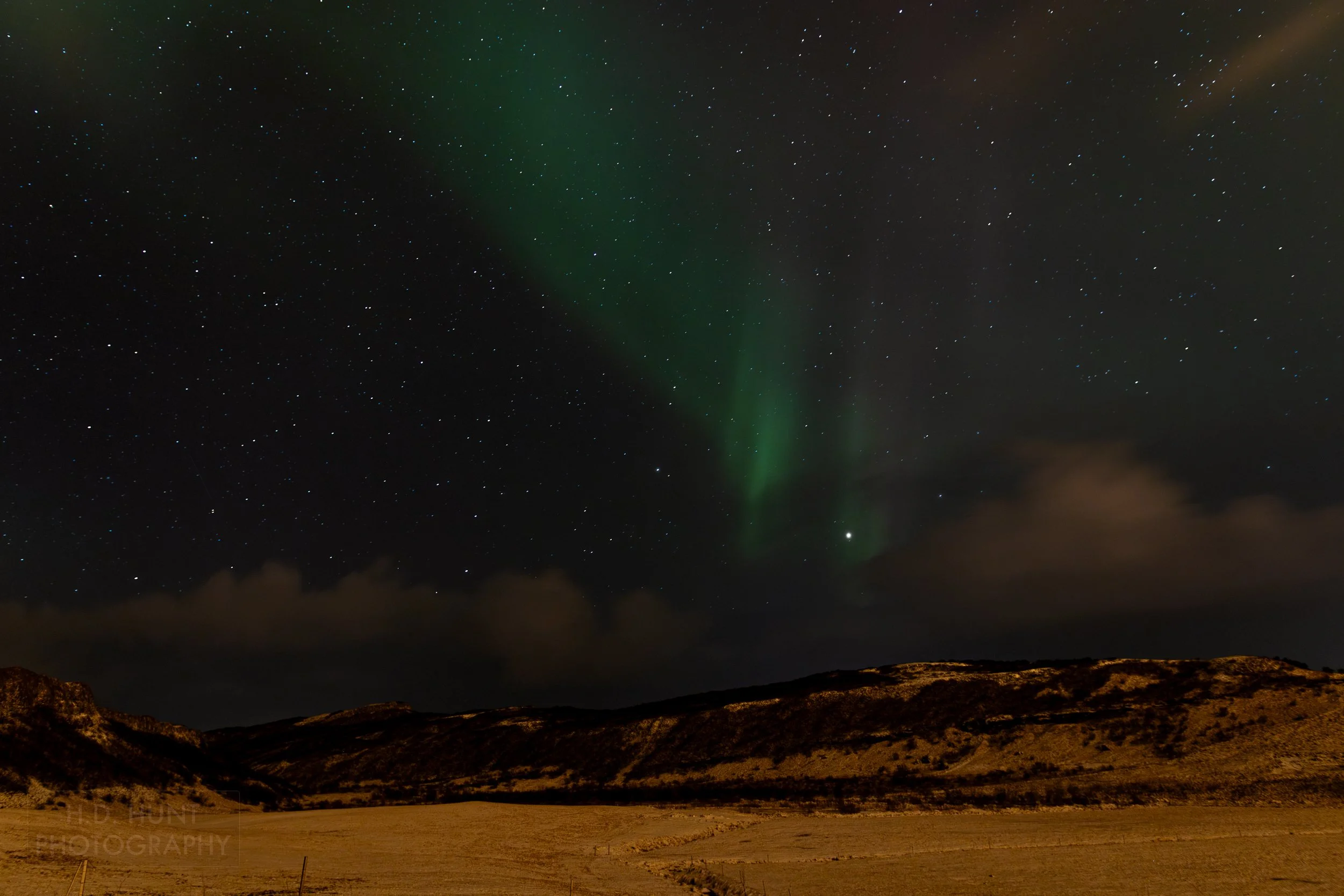 The green light of Aurora Borealis - the Northern Lights - is seen north of Reykholt í Biskupstungum, Iceland.