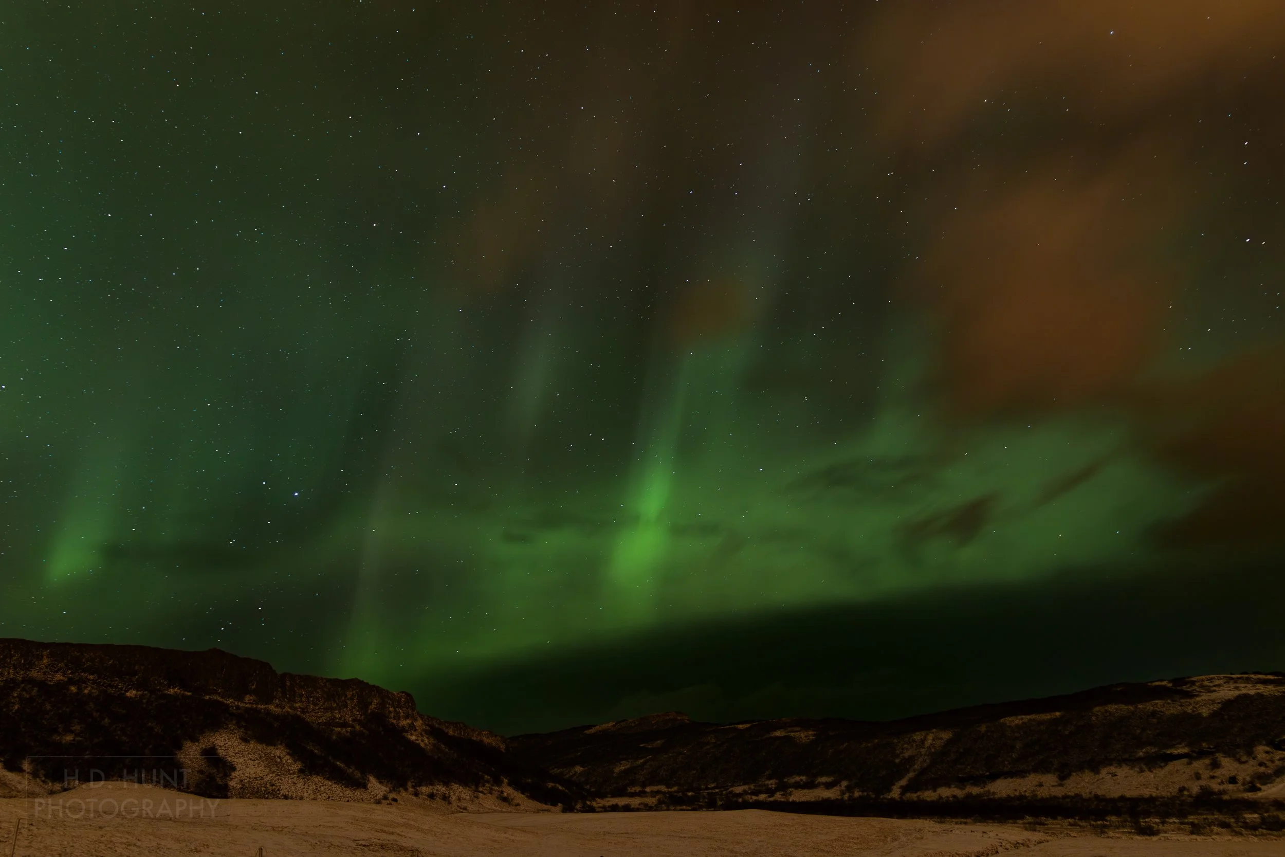 The green light of Aurora Borealis - the Northern Lights - is seen north of Reykholt í Biskupstungum, Iceland.