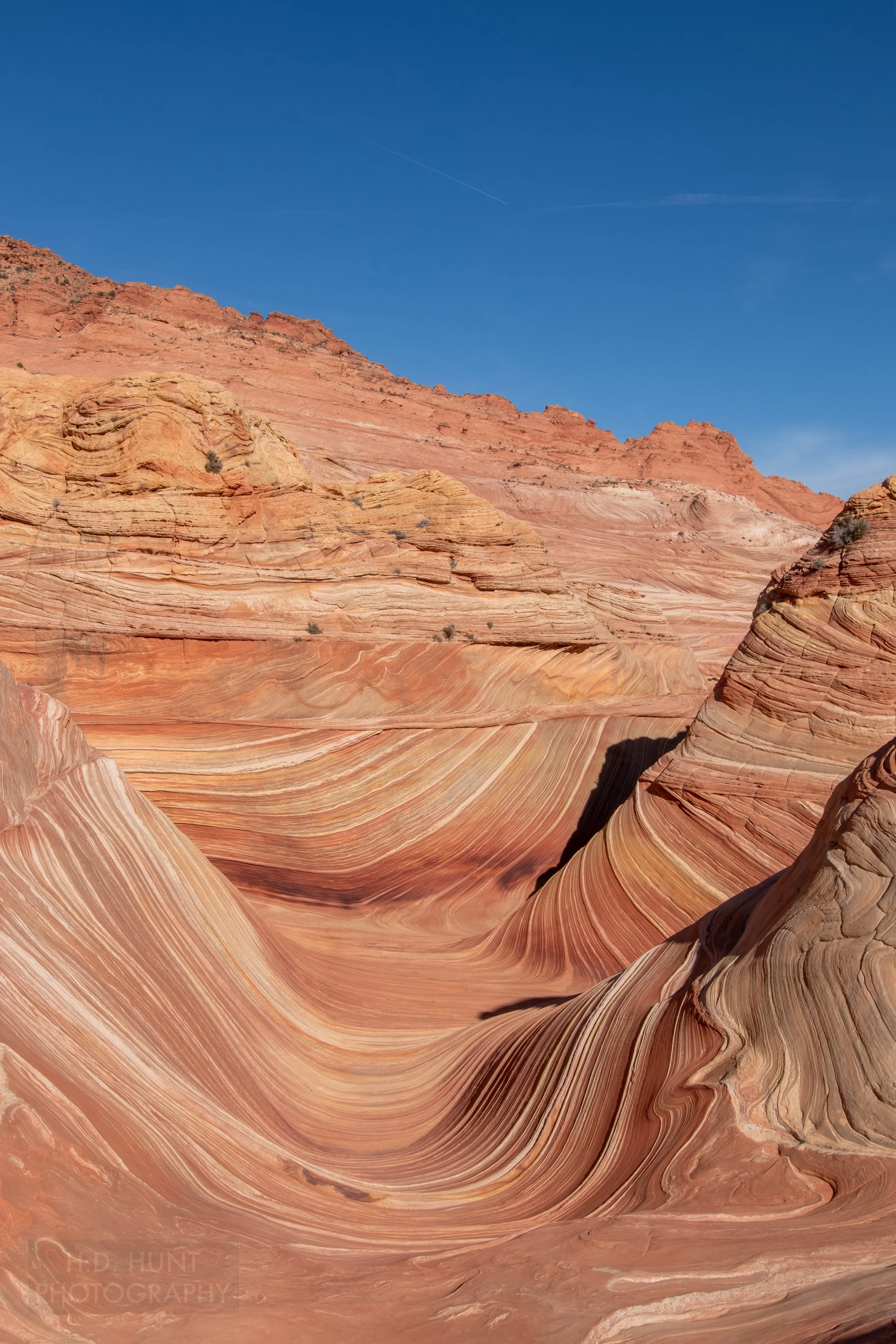 Details of the sandstone edges of The Wave are seen in Coyote Buttes North, Paria Canyon-Vermilion Cliffs Wilderness, Arizona, United States.