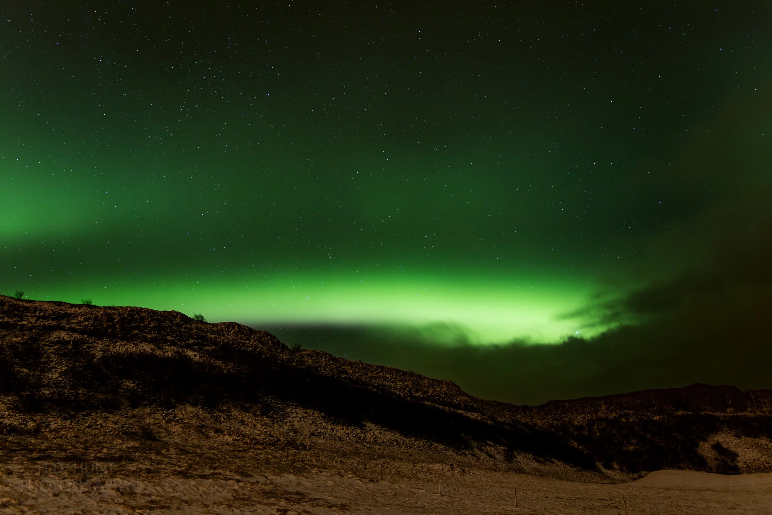 The green light of Aurora Borealis - the Northern Lights - is seen north of Reykholt í Biskupstungum, Iceland.