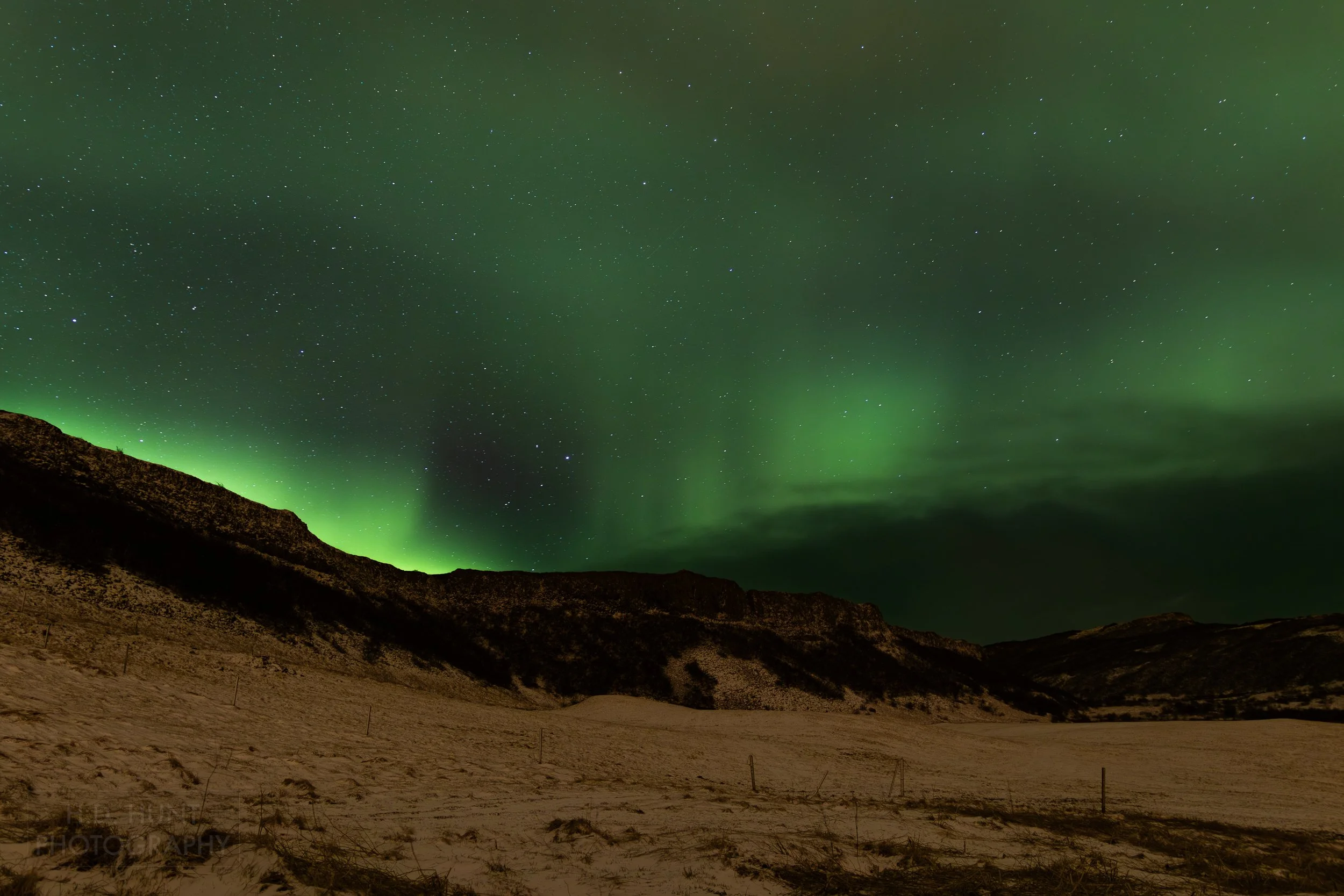 The green light of Aurora Borealis - the Northern Lights - is seen north of Reykholt í Biskupstungum, Iceland.