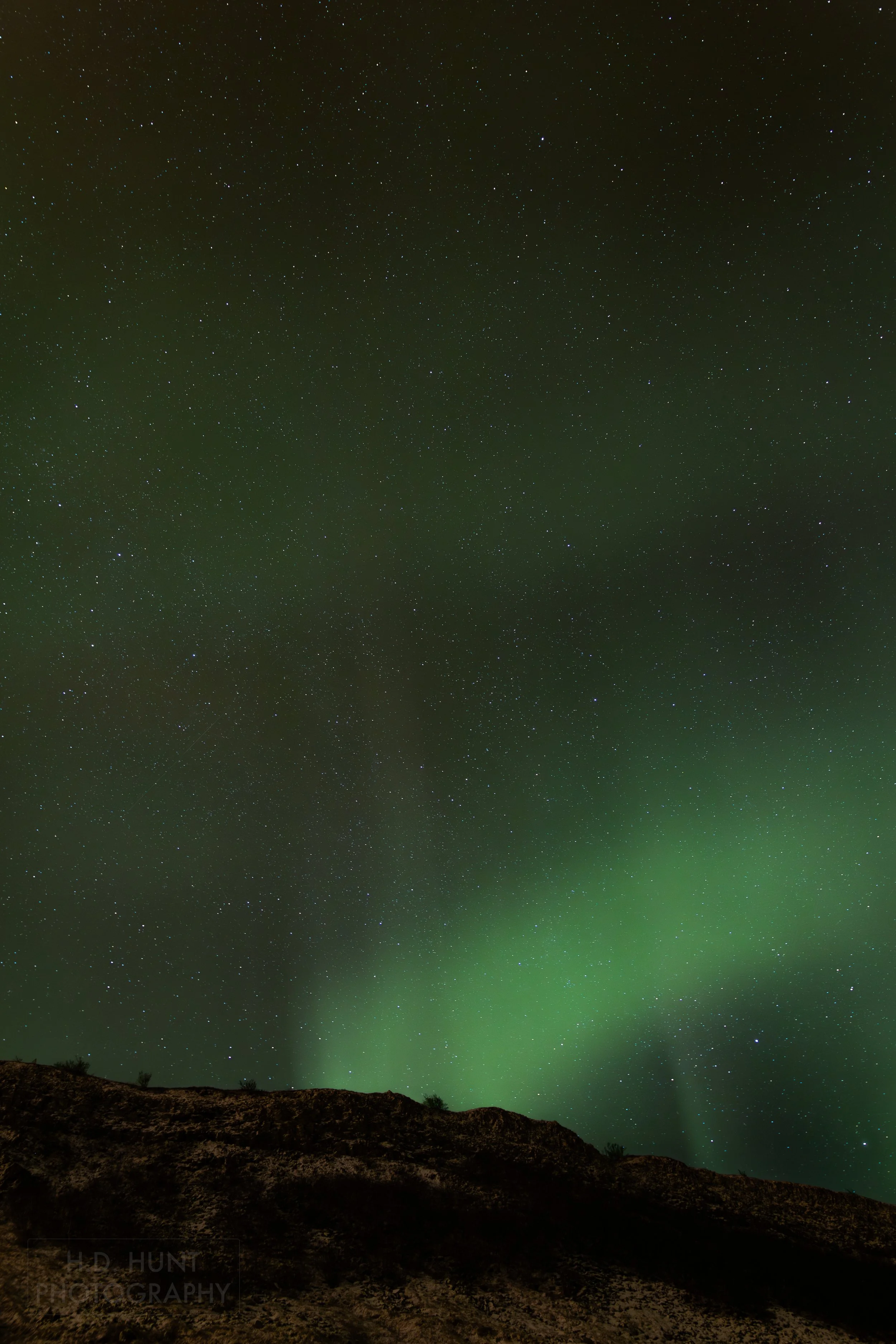 The green light of Aurora Borealis - the Northern Lights - is seen north of Reykholt í Biskupstungum, Iceland.