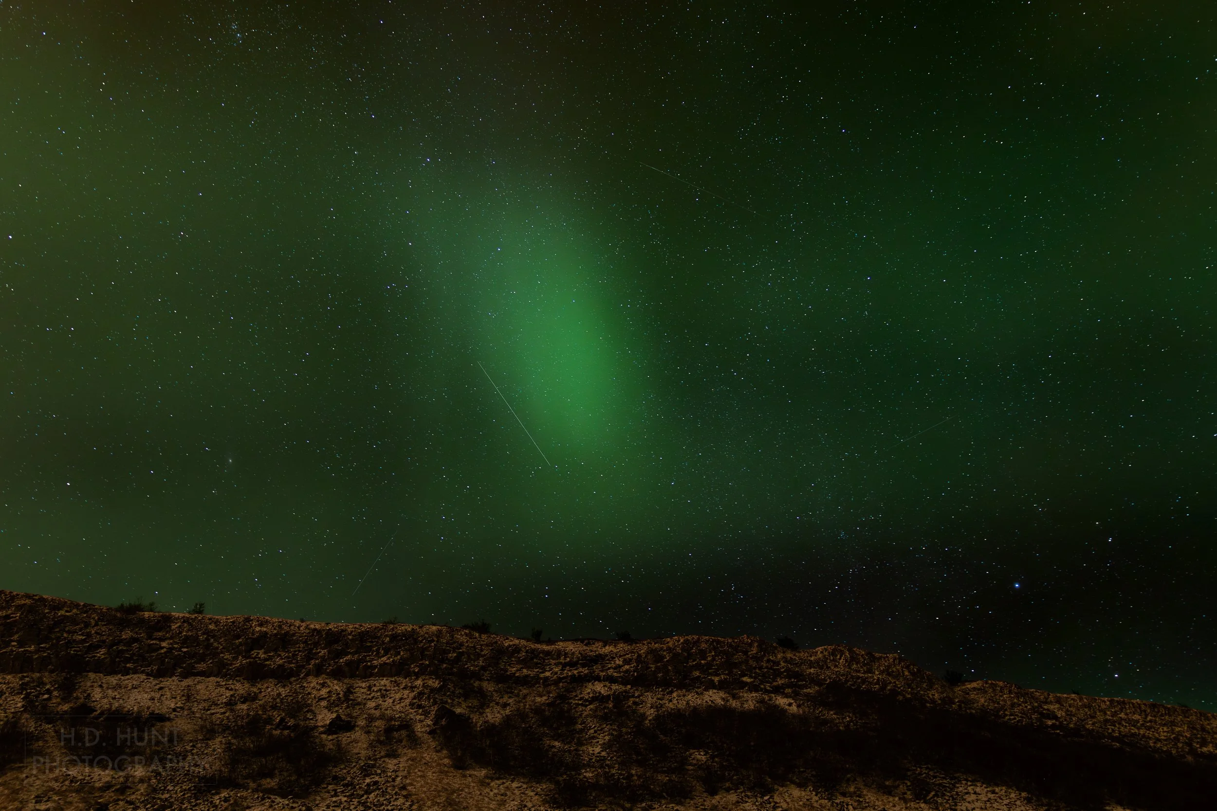 The green light of Aurora Borealis - the Northern Lights - is seen north of Reykholt í Biskupstungum, Iceland.