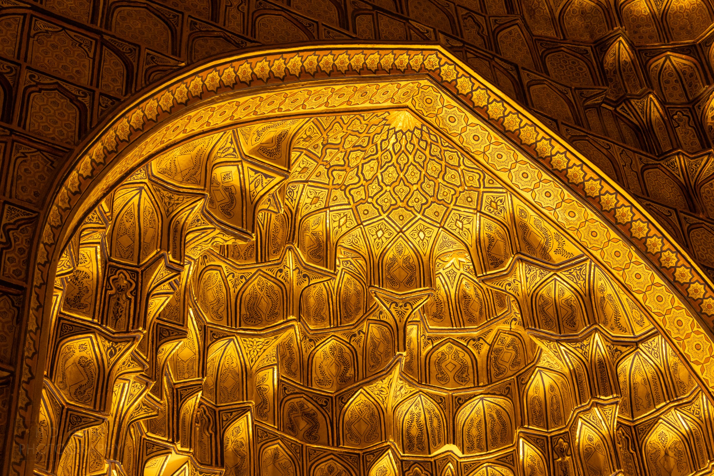Golden arch inside a tomb at the Shah-i-Zinda necropolis in Samarkand, Uzbekistan.