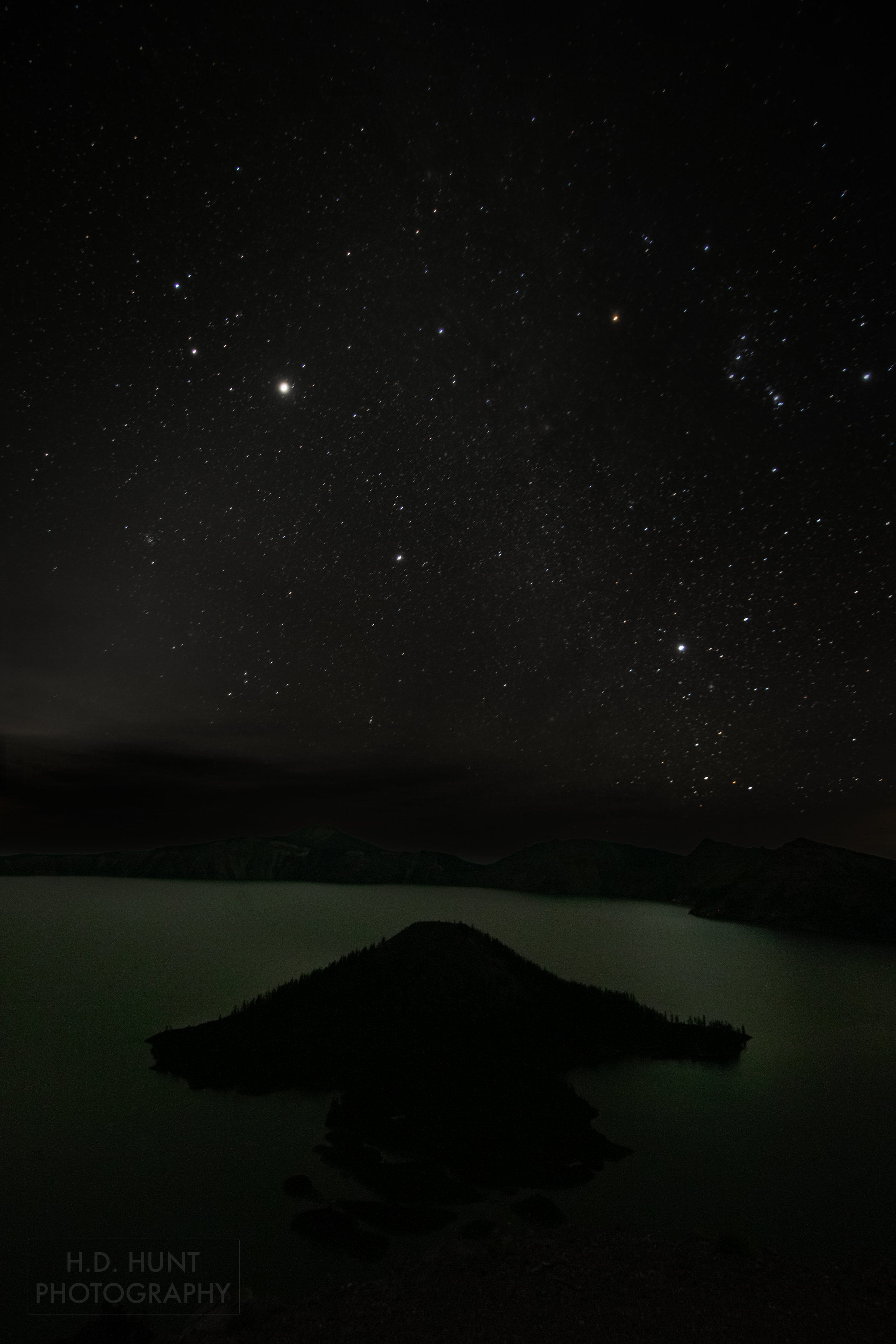 Stars rise above Crater Lake National Park, Oregon, United States.