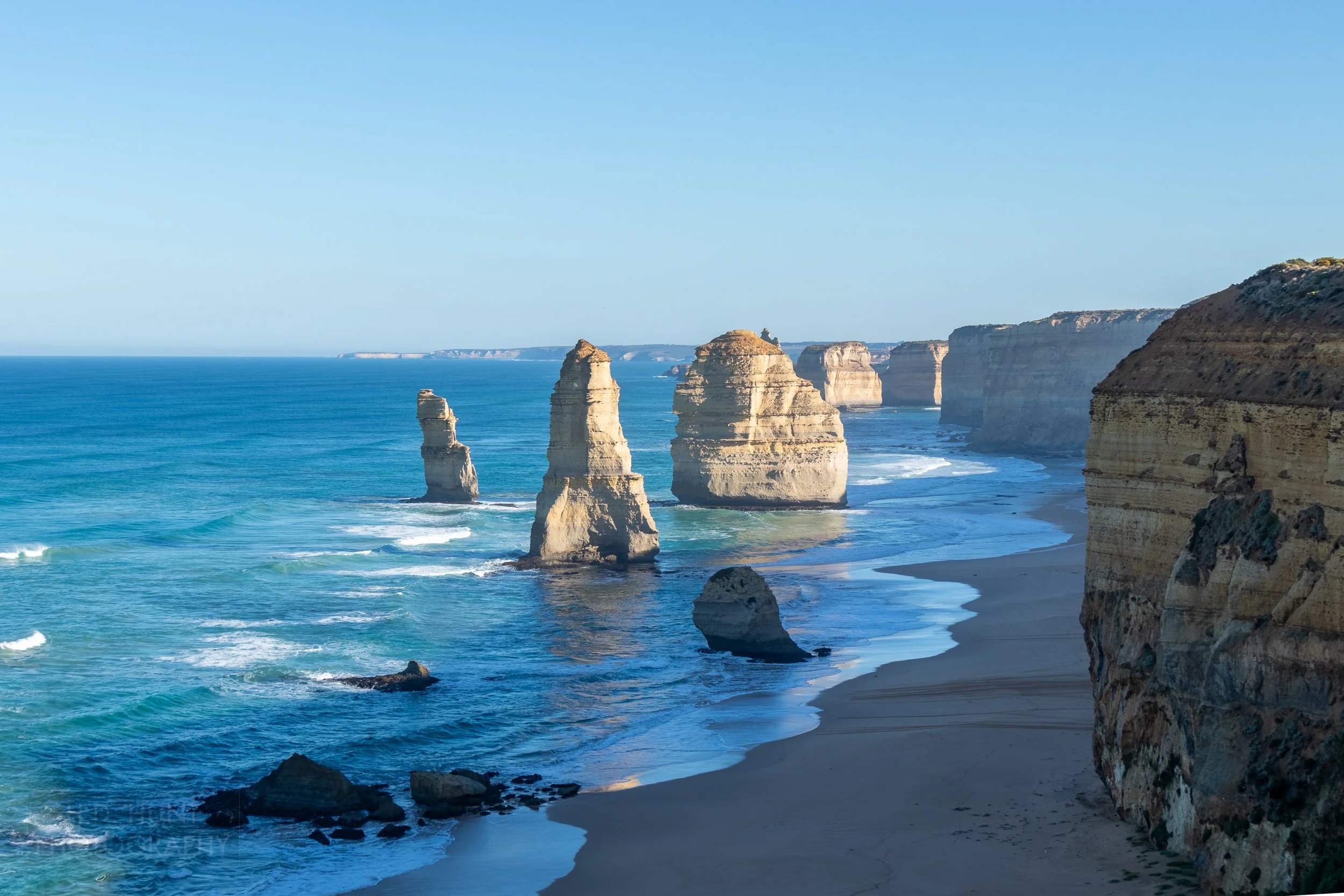 Several of The Twelve Apostles limestone stacks are seen from The Twelve Apostles Viewpoint, Victoria, Australia.