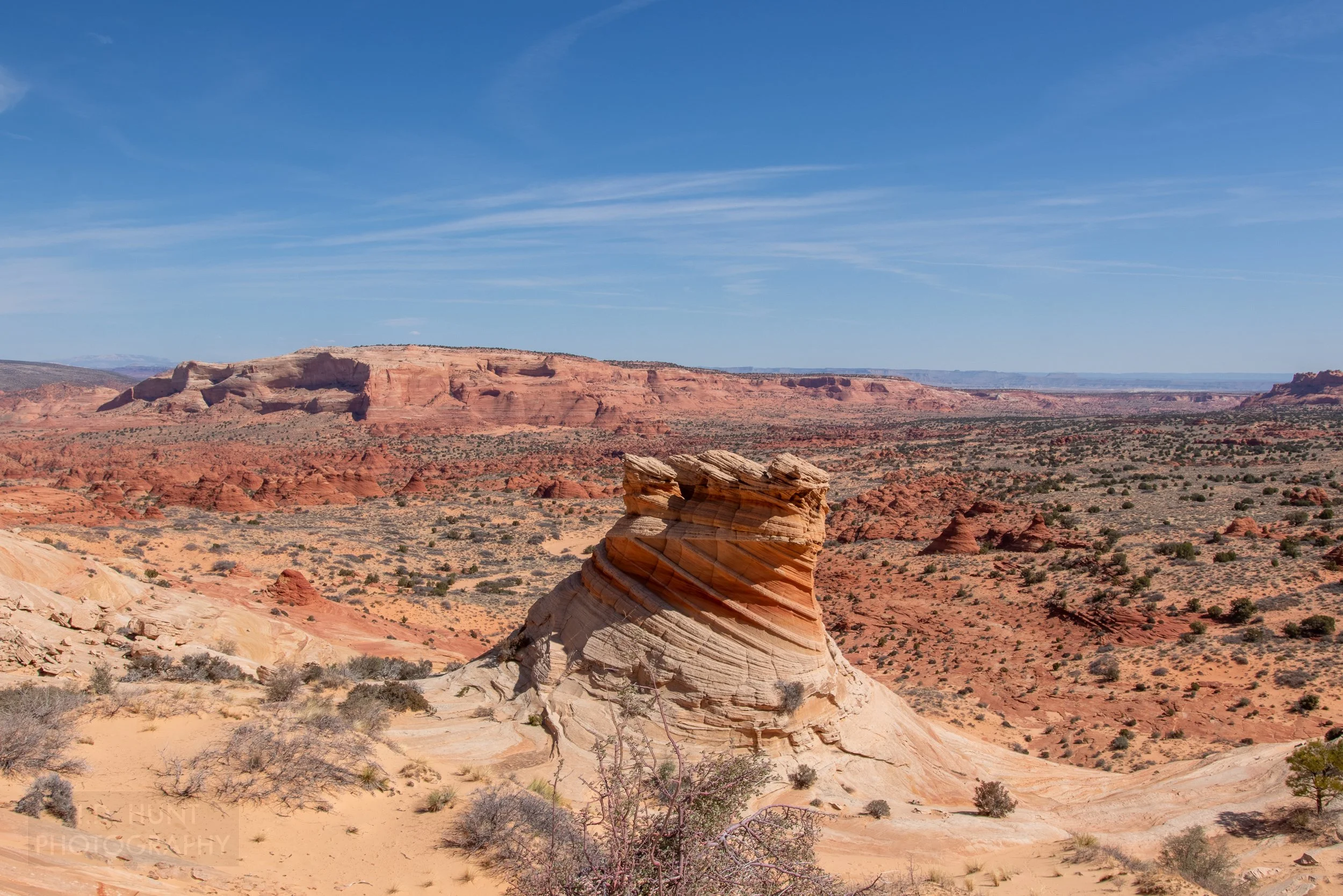 A heavily wind-eroded pillar of sandstone is seen in Coyote Buttes North, Paria Canyon-Vermilion Cliffs Wilderness, Arizona, United States.