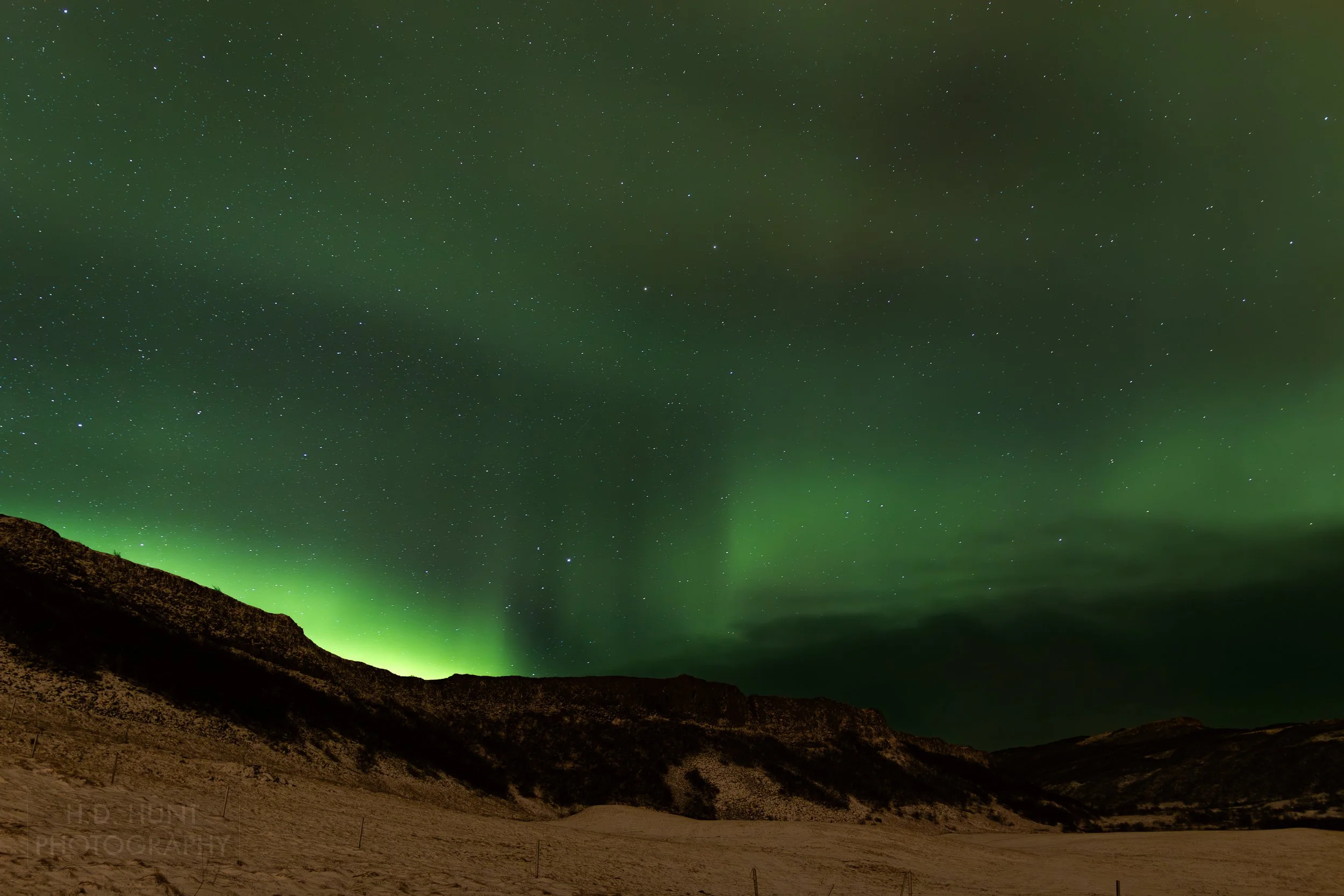 The green light of Aurora Borealis - the Northern Lights - is seen north of Reykholt í Biskupstungum, Iceland.