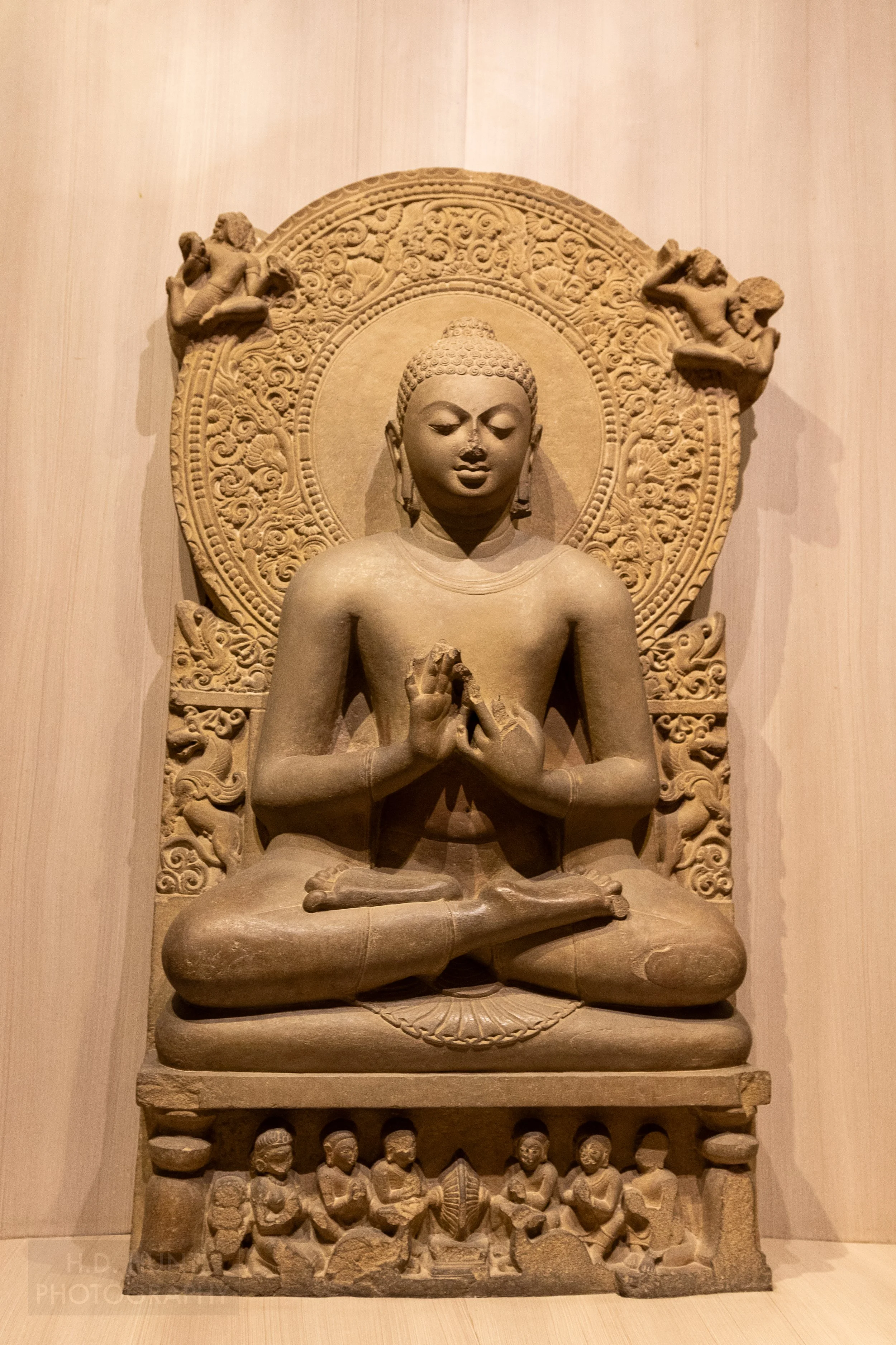 An ancient statue depicting Buddha praying, Sarnath, India.