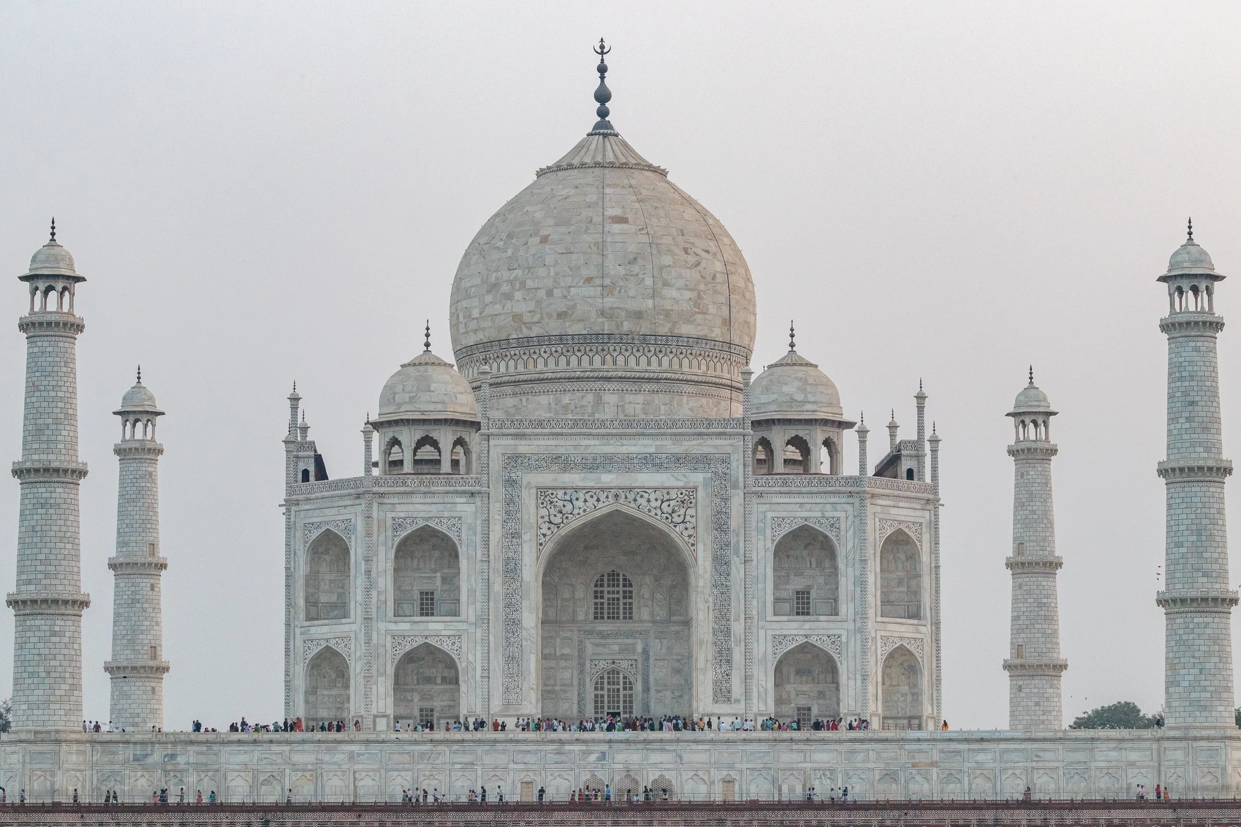 The main buildings of the Taj Mahal are seen from across the Yamuna River, Agra, India.