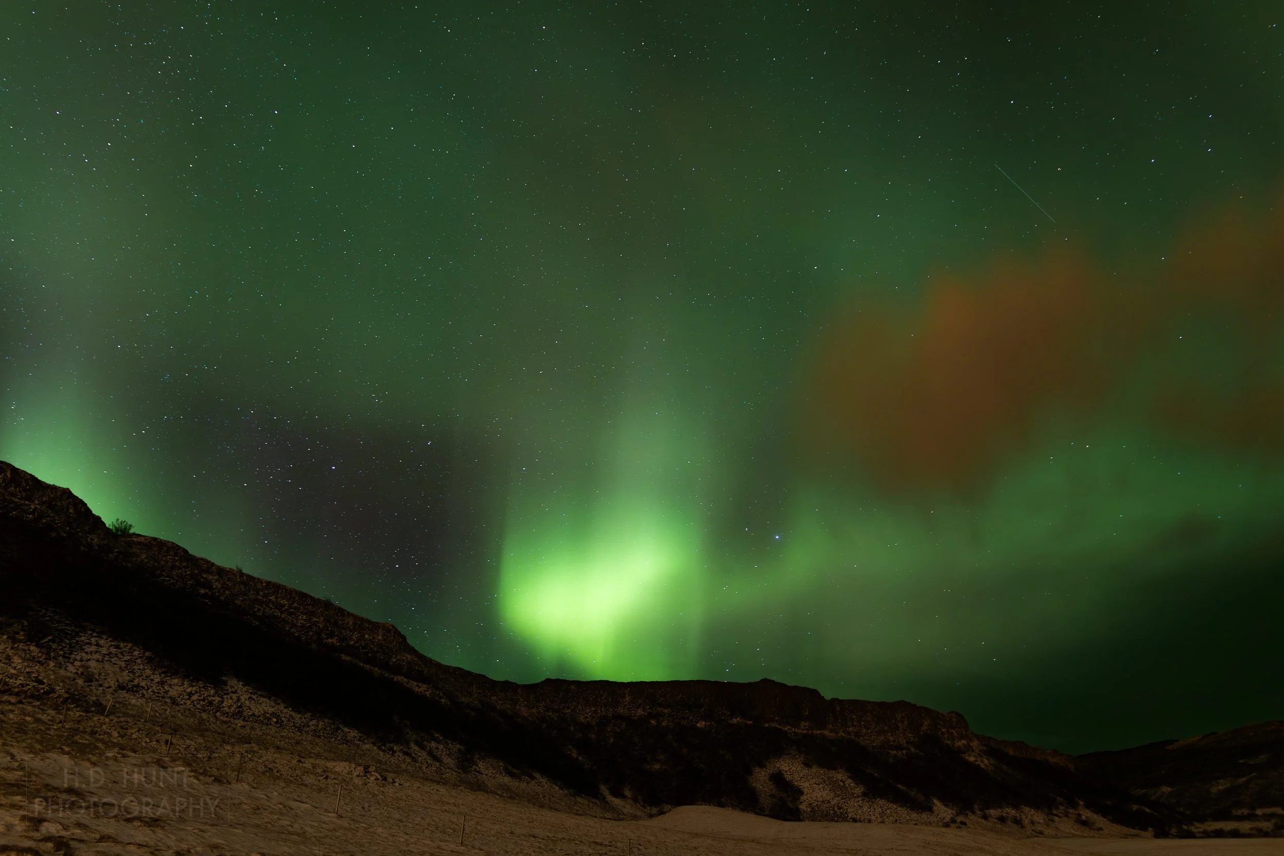 The green light of Aurora Borealis - the Northern Lights - is seen north of Reykholt í Biskupstungum, Iceland.