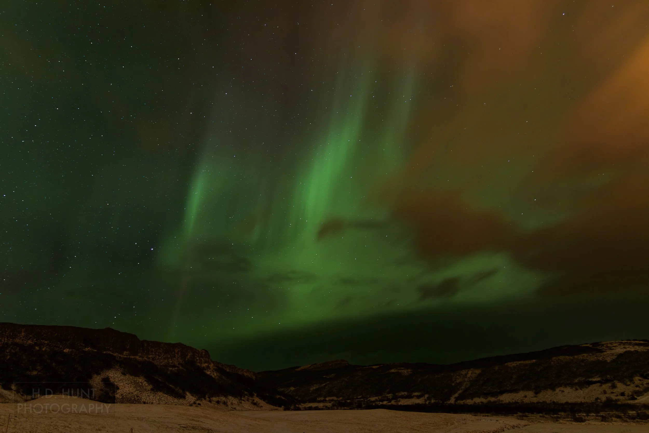 The green light of Aurora Borealis - the Northern Lights - is seen north of Reykholt í Biskupstungum, Iceland.