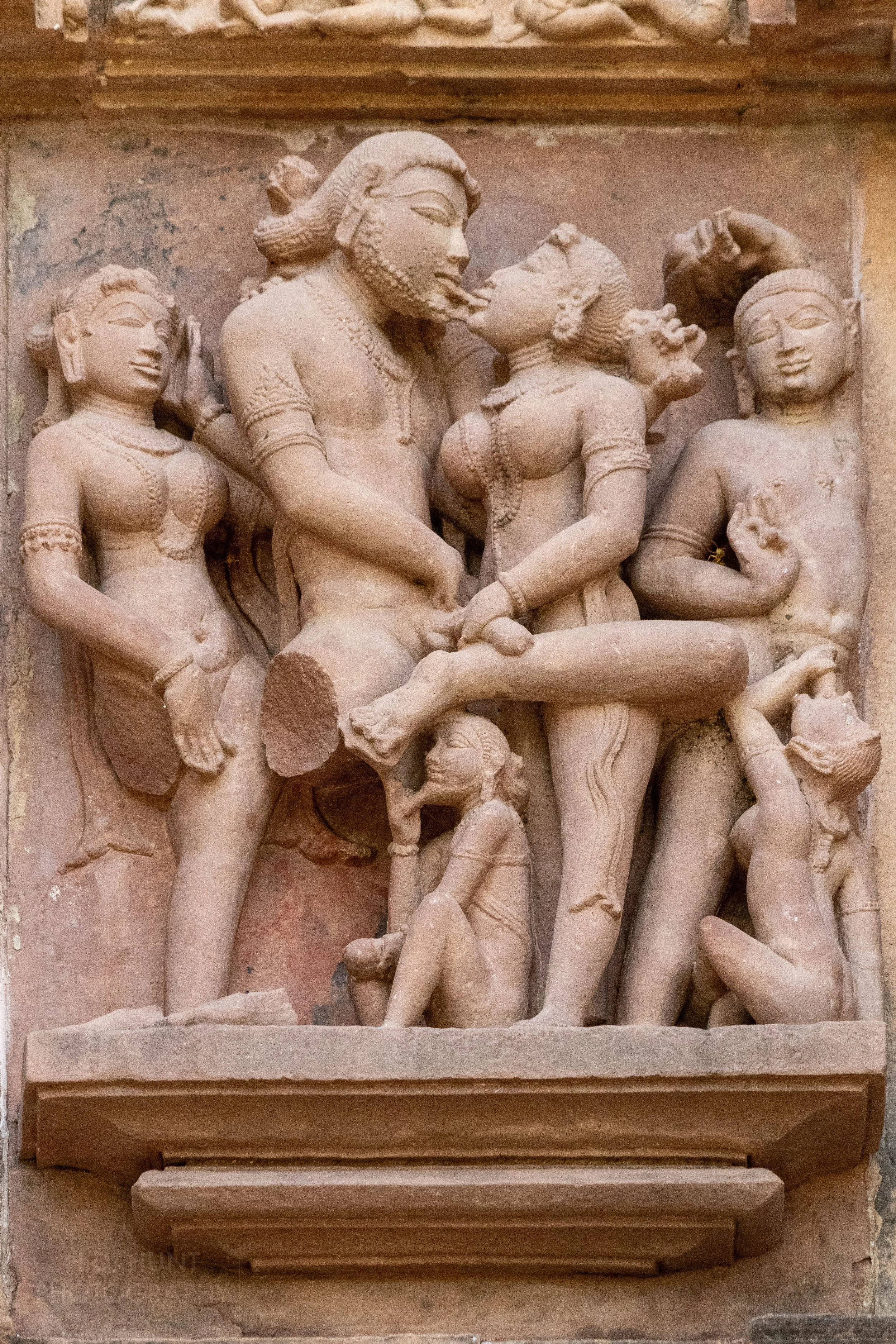 Close-up of the stone carvings adoring the Lakshmana Temple, Khajuraho Group of Monuments, India.