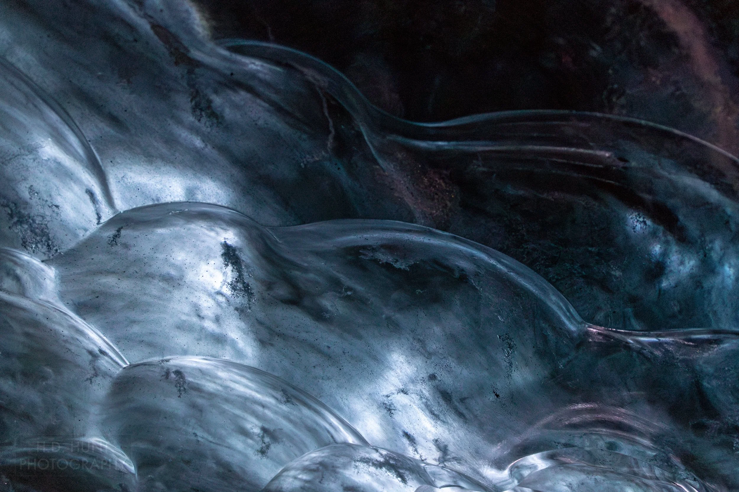 The wall of an ice cave is seen at Vatnajökull, Iceland.