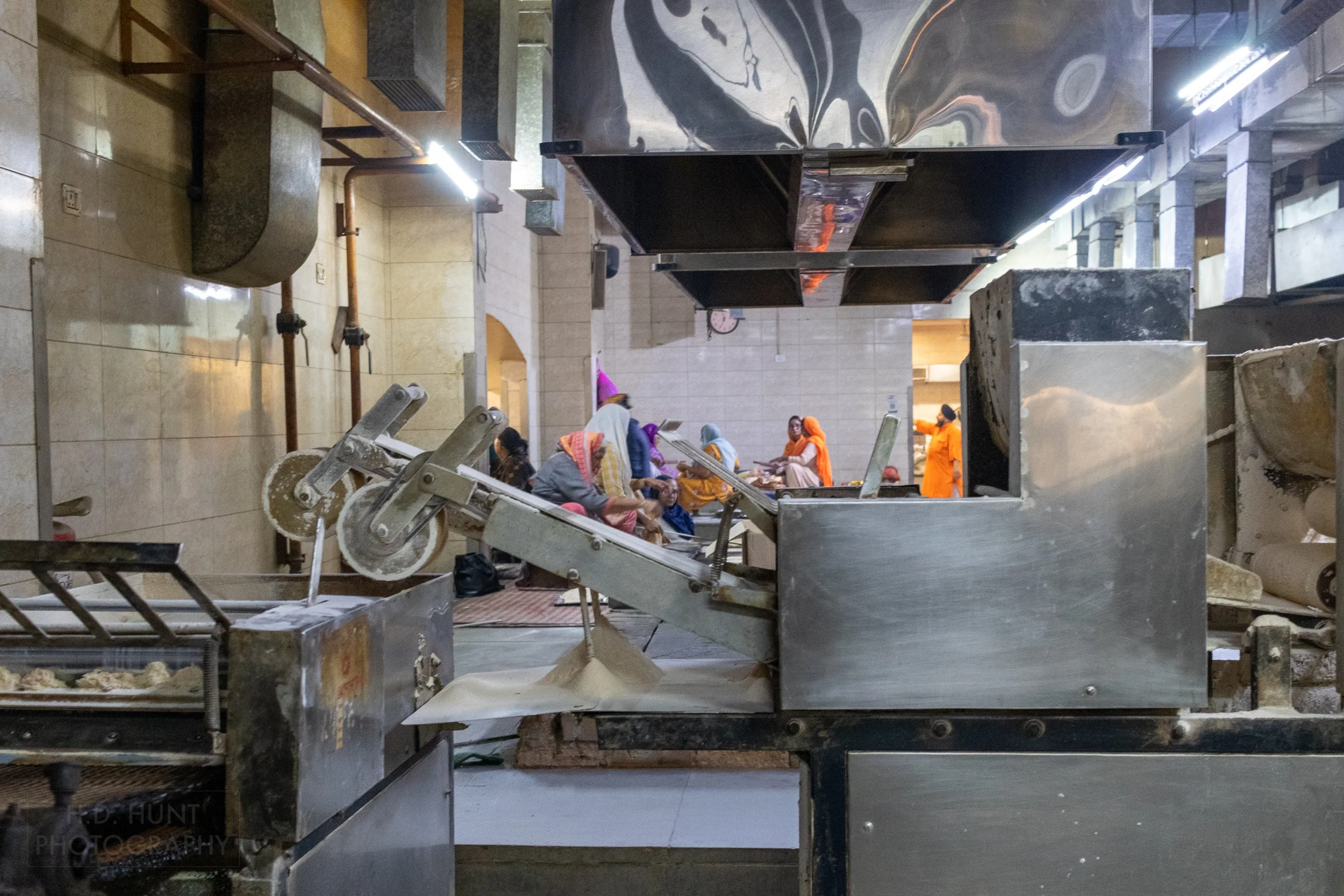 Stainless steel kitchen equipment is seen within Gurdwara Bangla Sahib, Delhi, India.