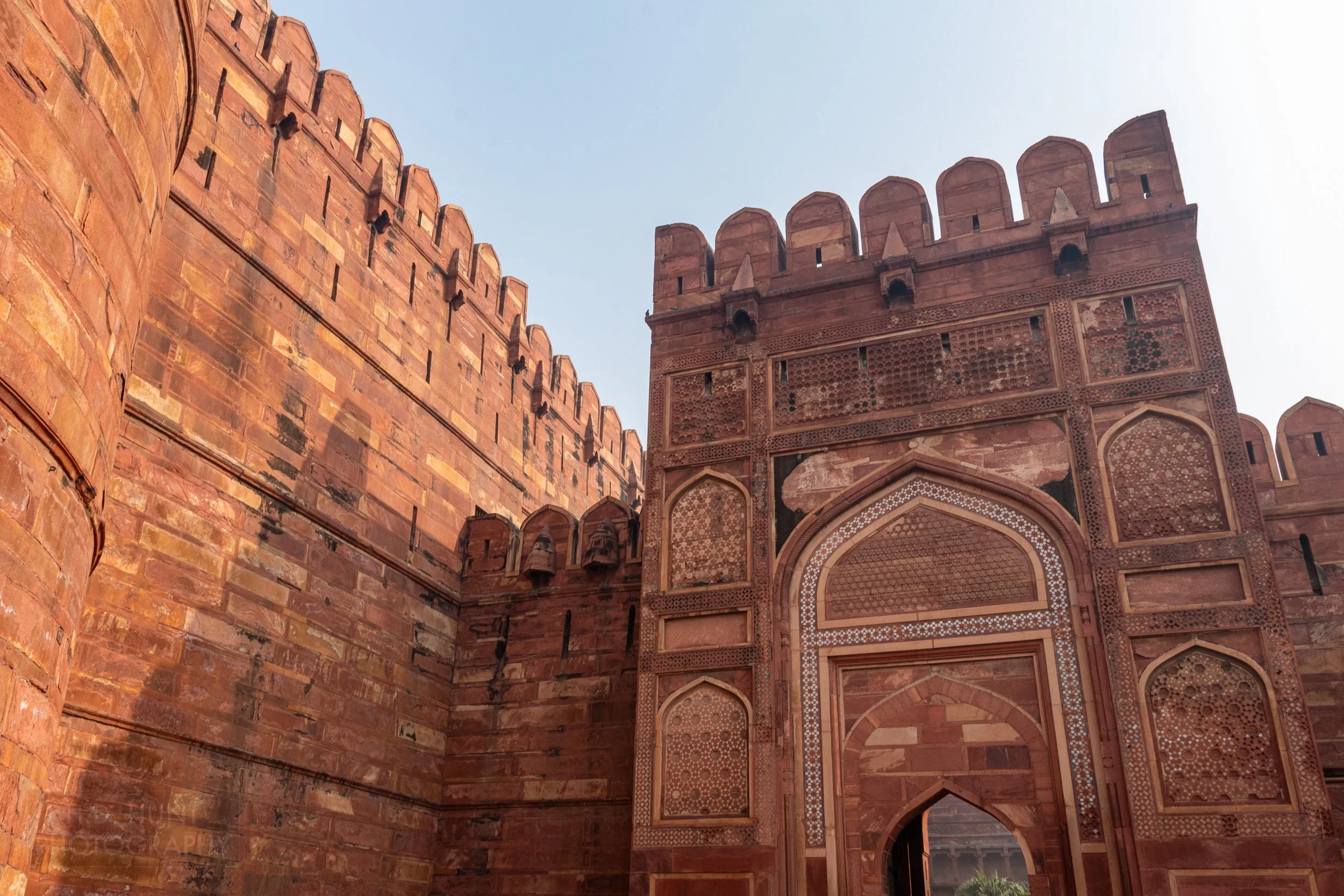A large gate of red sandstone on the exterior of Agra Fort, Agra, India.