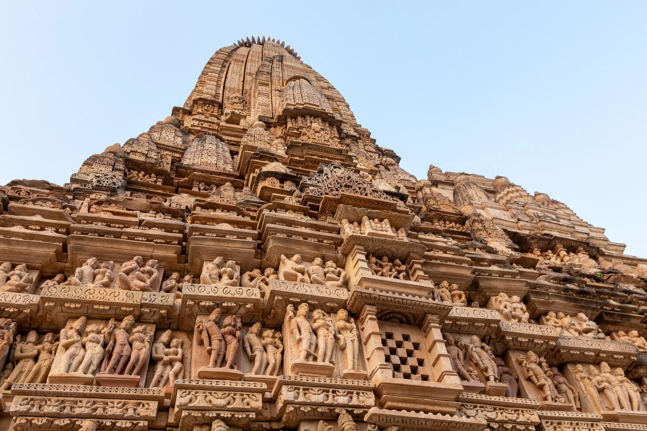 A close-up of the stone figures adorning Parshvanatha, Khajuraho, India.