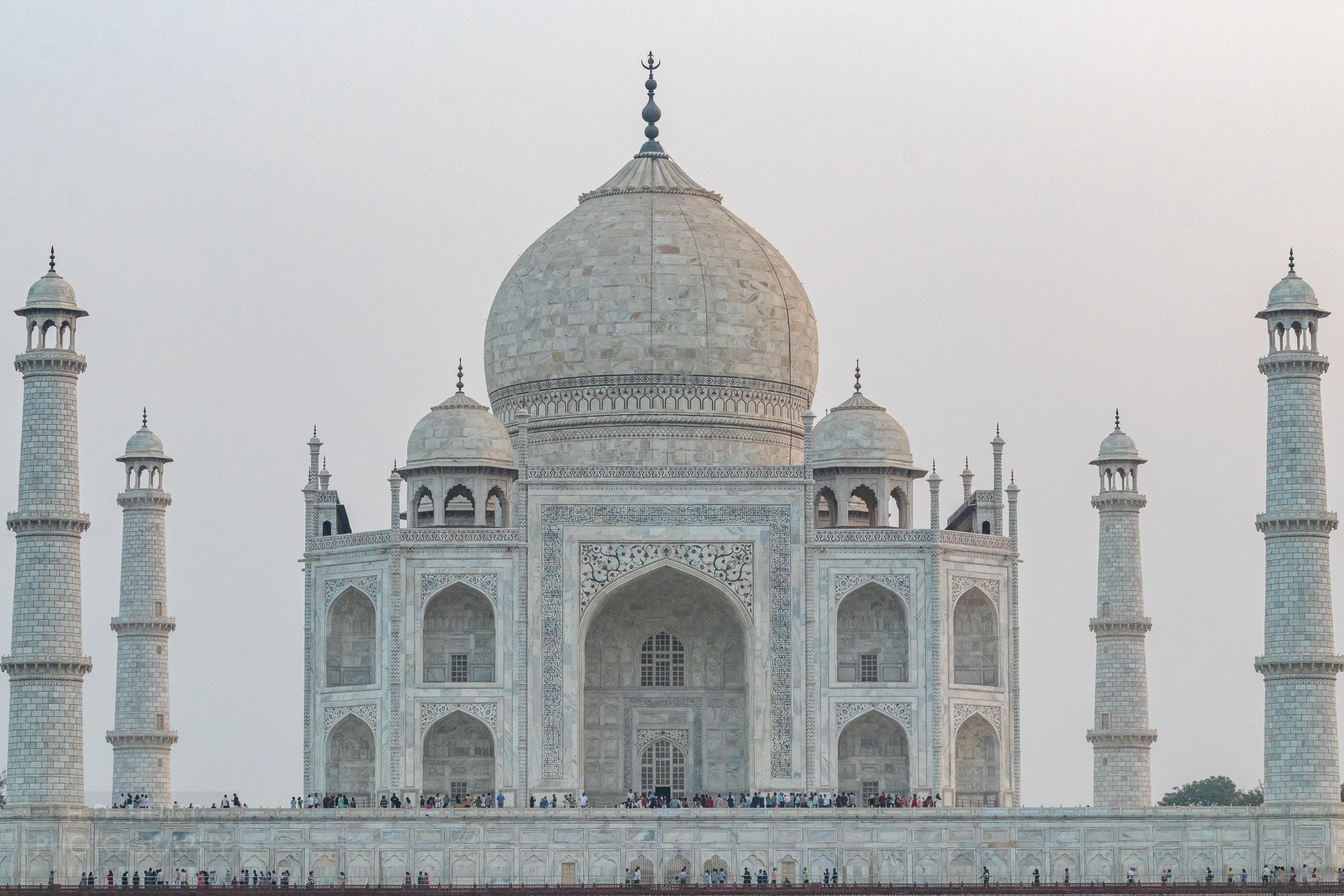 The main buildings of the Taj Mahal are seen from across the Yamuna River, Agra, India.