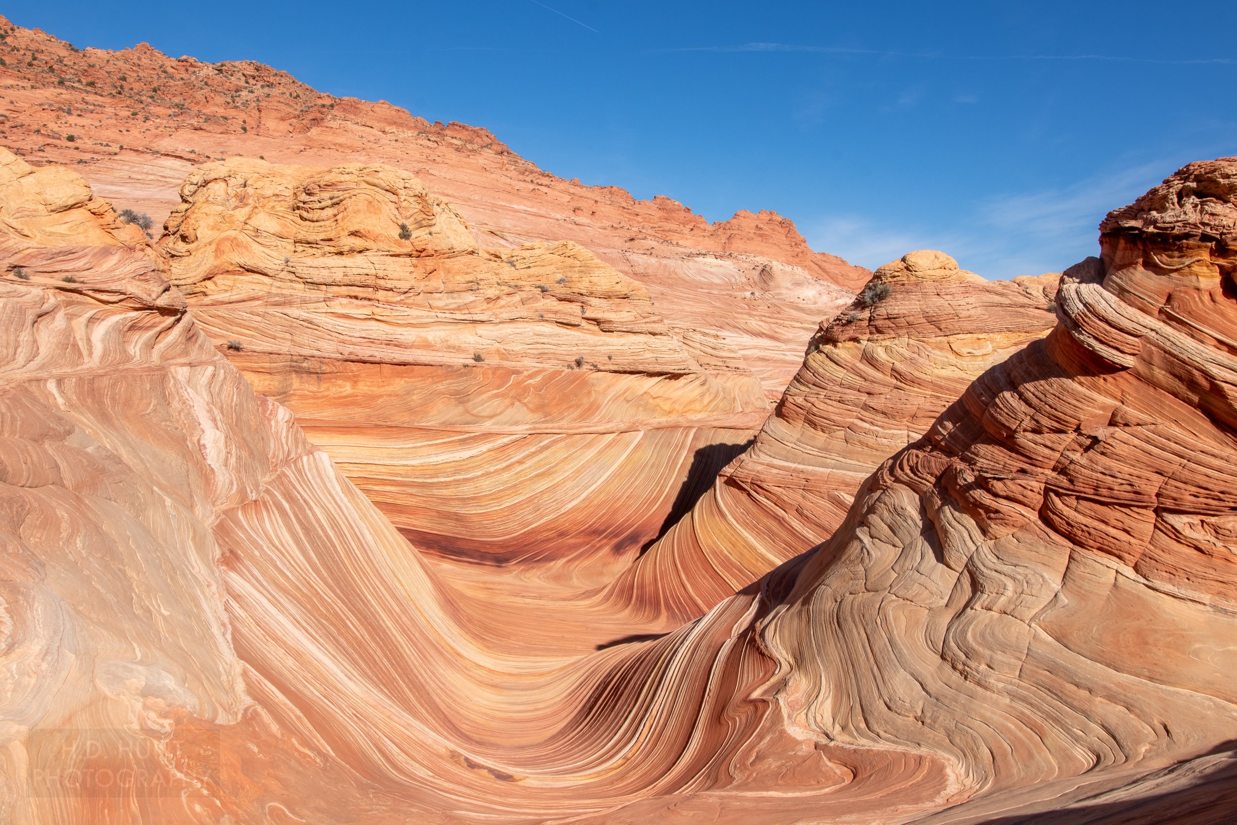 The bowl of The Wave, a u-shaped sandstone rock formation, are seen in Coyote Buttes North, Paria Canyon-Vermilion Cliffs Wilderness, Arizona, United States.
