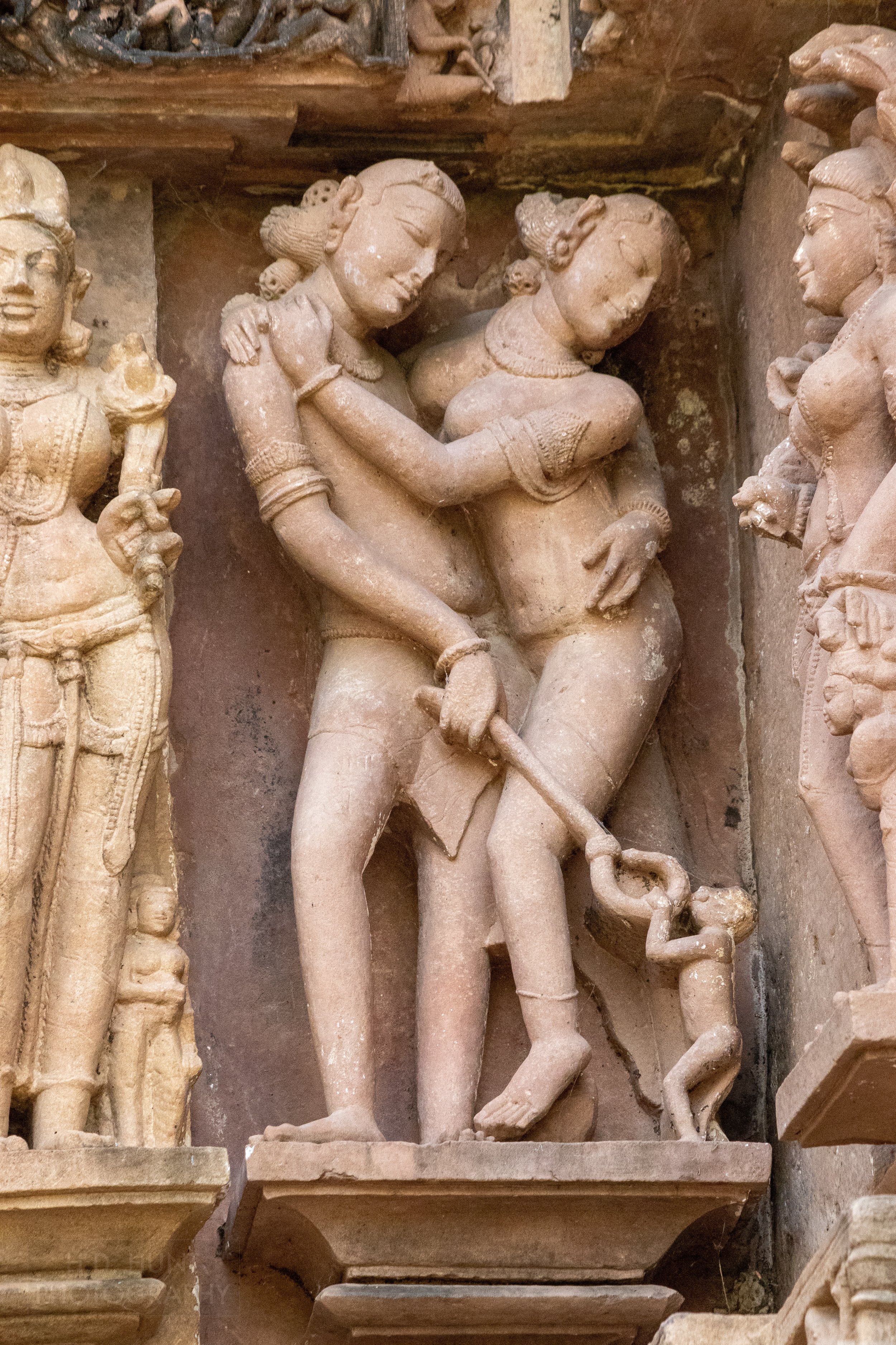 Close-up of the stone carvings adoring the Lakshmana Temple, Khajuraho Group of Monuments, India.