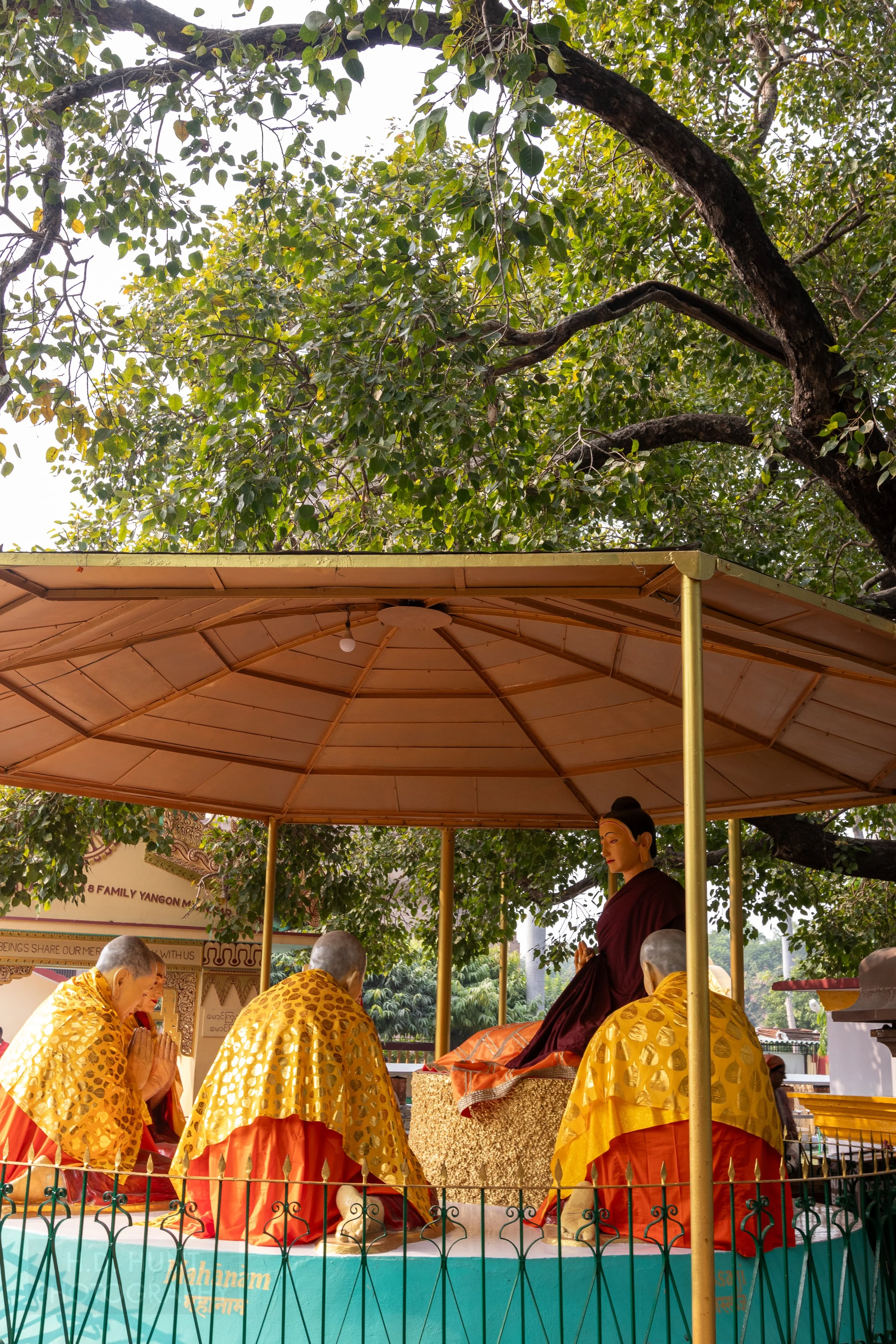 A series of statues depicting Buddha giving a sermon to followers, Sarnath, India.