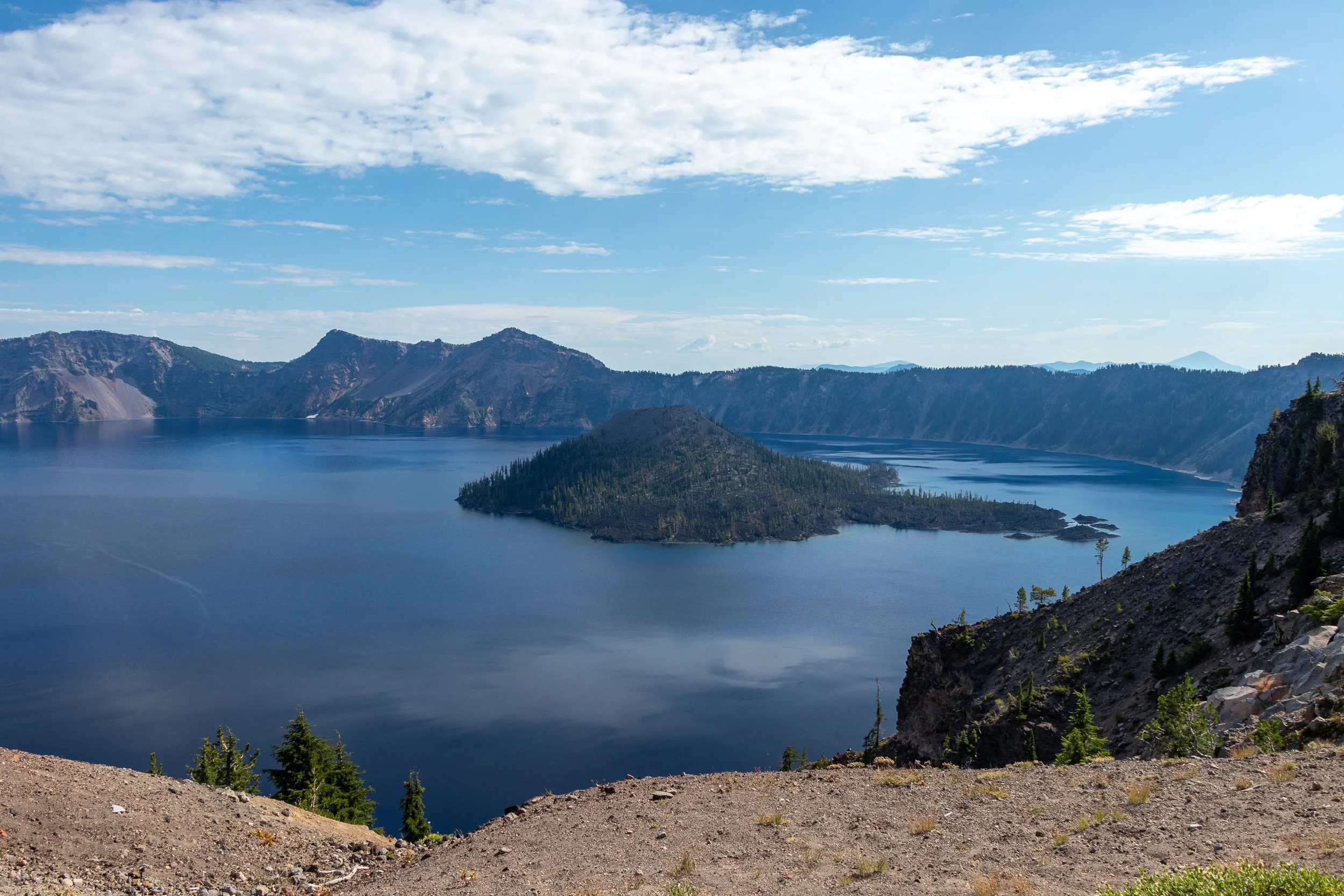 A view of Crater Lake from Merriam Point Overlook, with Wizard Island in the middle of the frame, Crater Lake National Park, Oregon, United States.