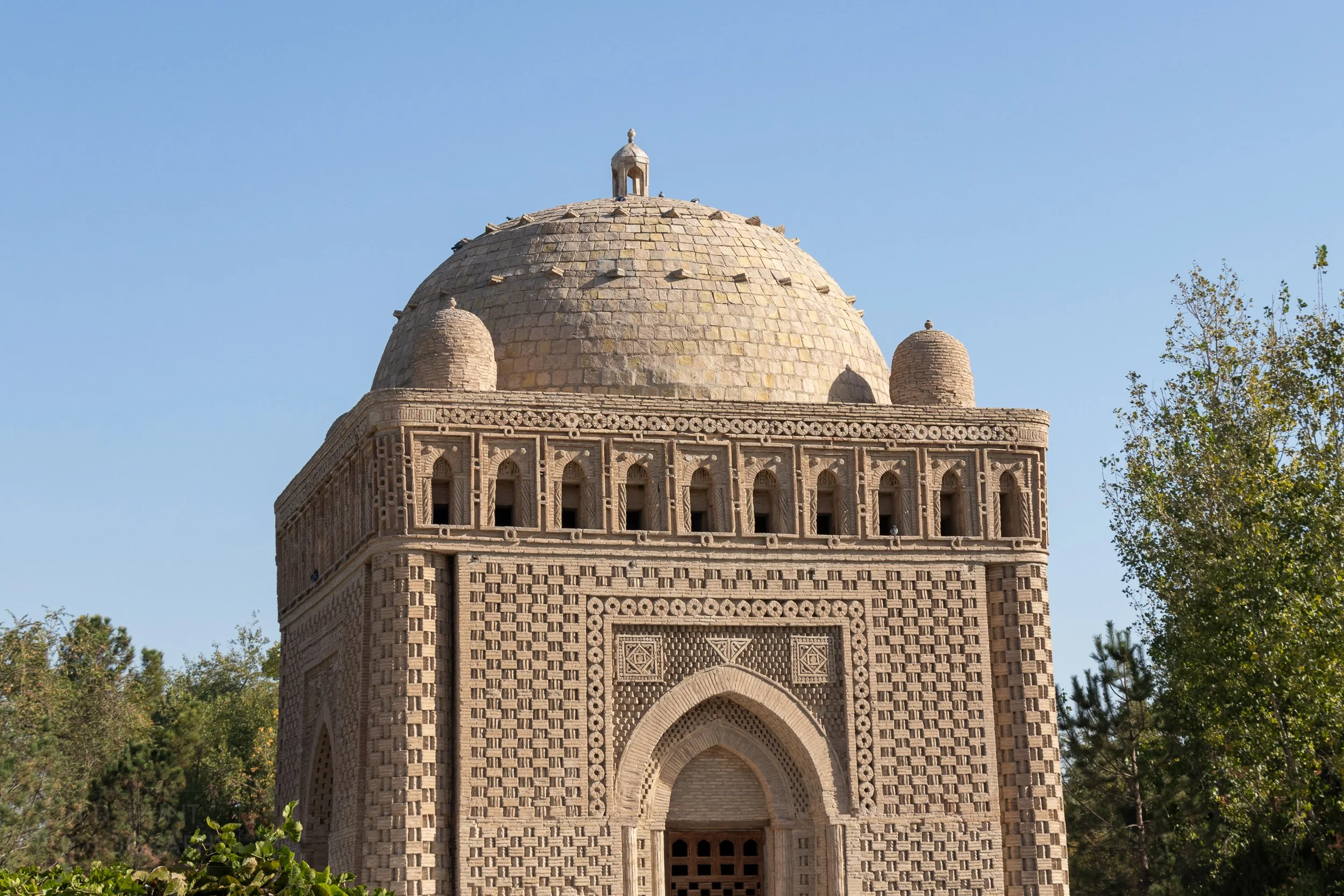 The stone exterior of the Samanid Mausoleum in Bukhara, Uzbekistan.
